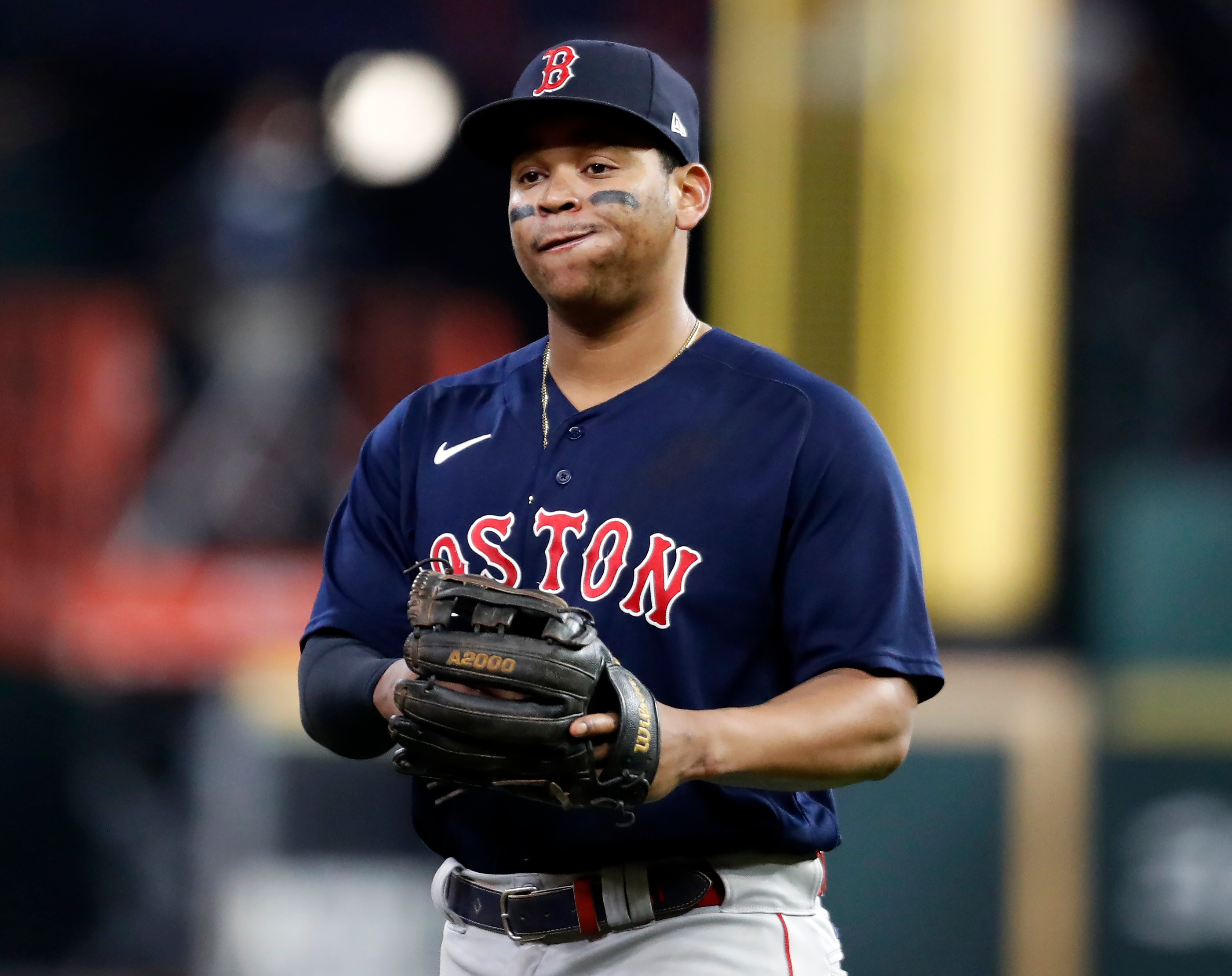 Houston - October 22: The Red Sox Rafael Devers is pictured after he made the last out of an inning. The Boston Red Sox visited the Houston Astros for Game Six of the ALCS at Minute Maid Park in Houston, TX on Oct. 22, 2021. (Photo by Jim Davis/The Boston Globe via Getty Images)