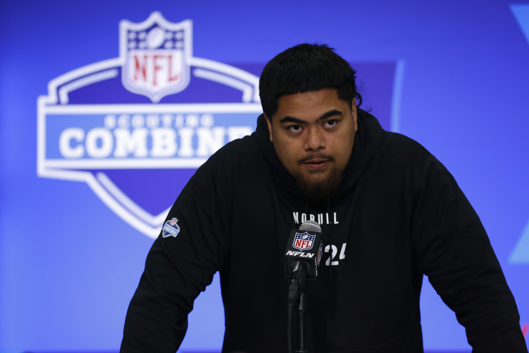 INDIANAPOLIS, INDIANA - MARCH 02: Taliese Fuaga #OL24 of the Oregon State Beavers speaks to the media during the 2024 NFL Combine at the Indiana Convention Center on March 02, 2024 in Indianapolis, Indiana. (Photo by Justin Casterline/Getty Images)