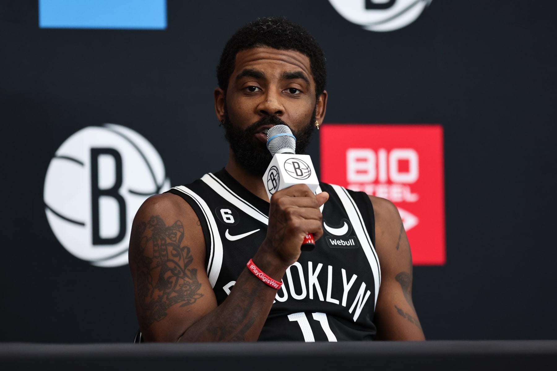 NEW YORK, NEW YORK - SEPTEMBER 26: Kyrie Irving #11 of the Brooklyn Nets speaks during a press conference at Brooklyn Nets Media Day at HSS Training Center on September 26, 2022 in the Brooklyn borough of New York City. NOTE TO USER: User expressly acknowledges and agrees that, by downloading and/or using this photograph, User is consenting to the terms and conditions of the Getty Images License Agreement. (Photo by Dustin Satloff/Getty Images)