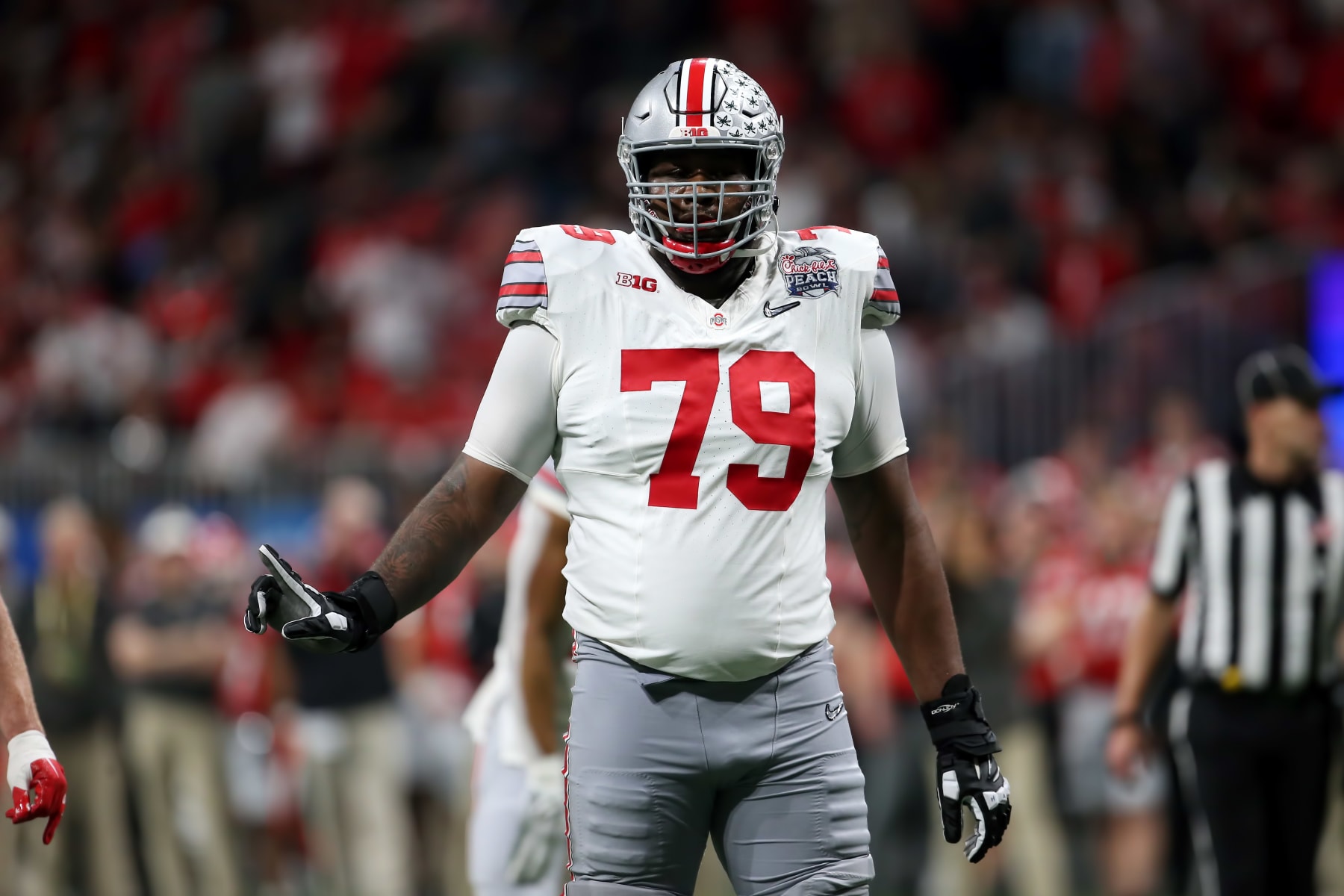 ATLANTA, GA - DECEMBER 31: Ohio State Buckeyes offensive lineman Dawand Jones (79) during the college football Playoff Semifinal game at the Chick-fil-a Peach Bowl between the Georgia Bulldogs and the Ohio State Buckeyes on December 31, 2022 at Mercedes-Benz Stadium in Atlanta, Georgia.  (Photo by Michael Wade/Icon Sportswire via Getty Images)