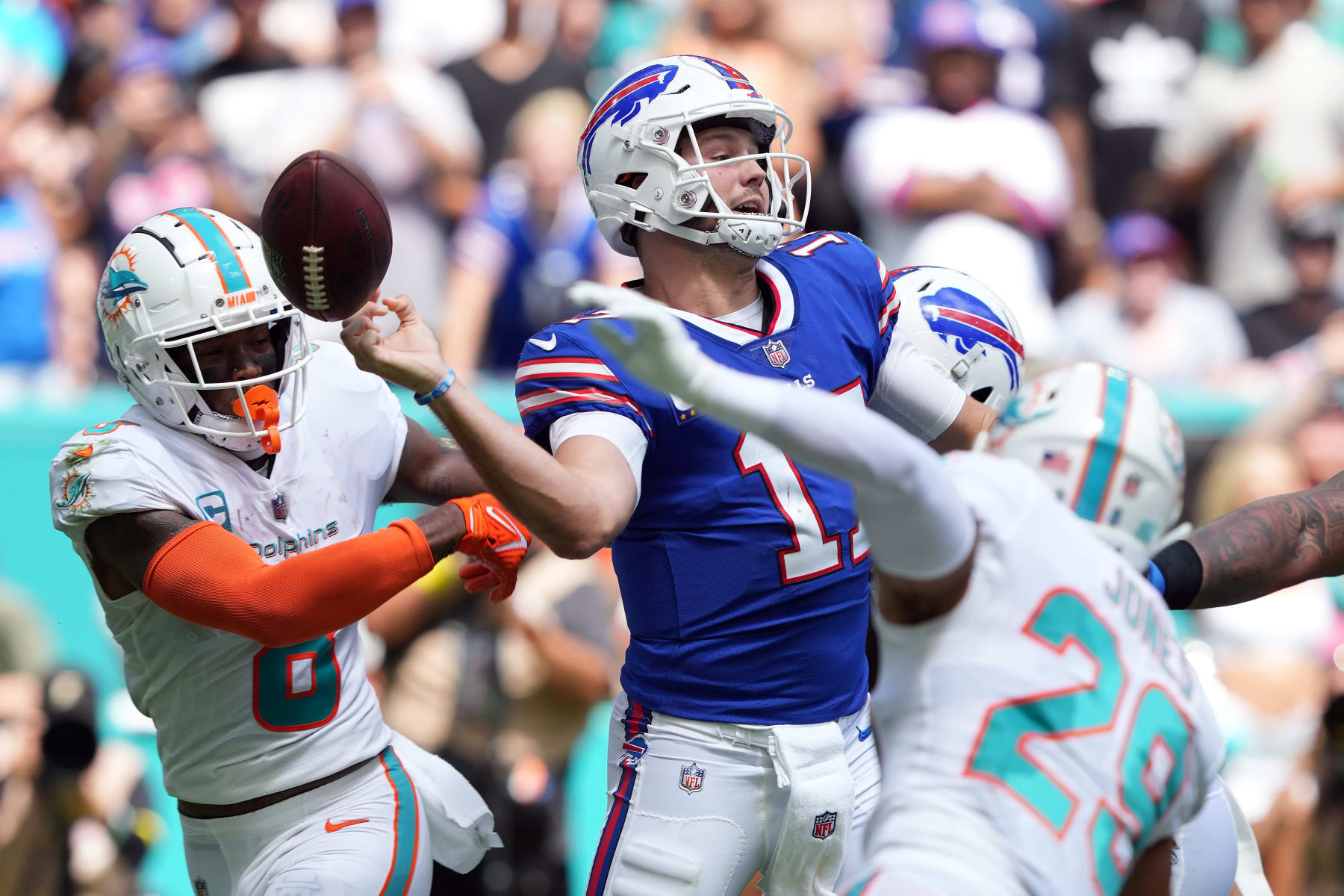 MIAMI GARDENS, FLORIDA - SEPTEMBER 25: Quarterback Josh Allen #17 of the Buffalo Bills loses control of the ball during the first half of the game against the Miami Dolphins at Hard Rock Stadium on September 25, 2022 in Miami Gardens, Florida. (Photo by Eric Espada/Getty Images)