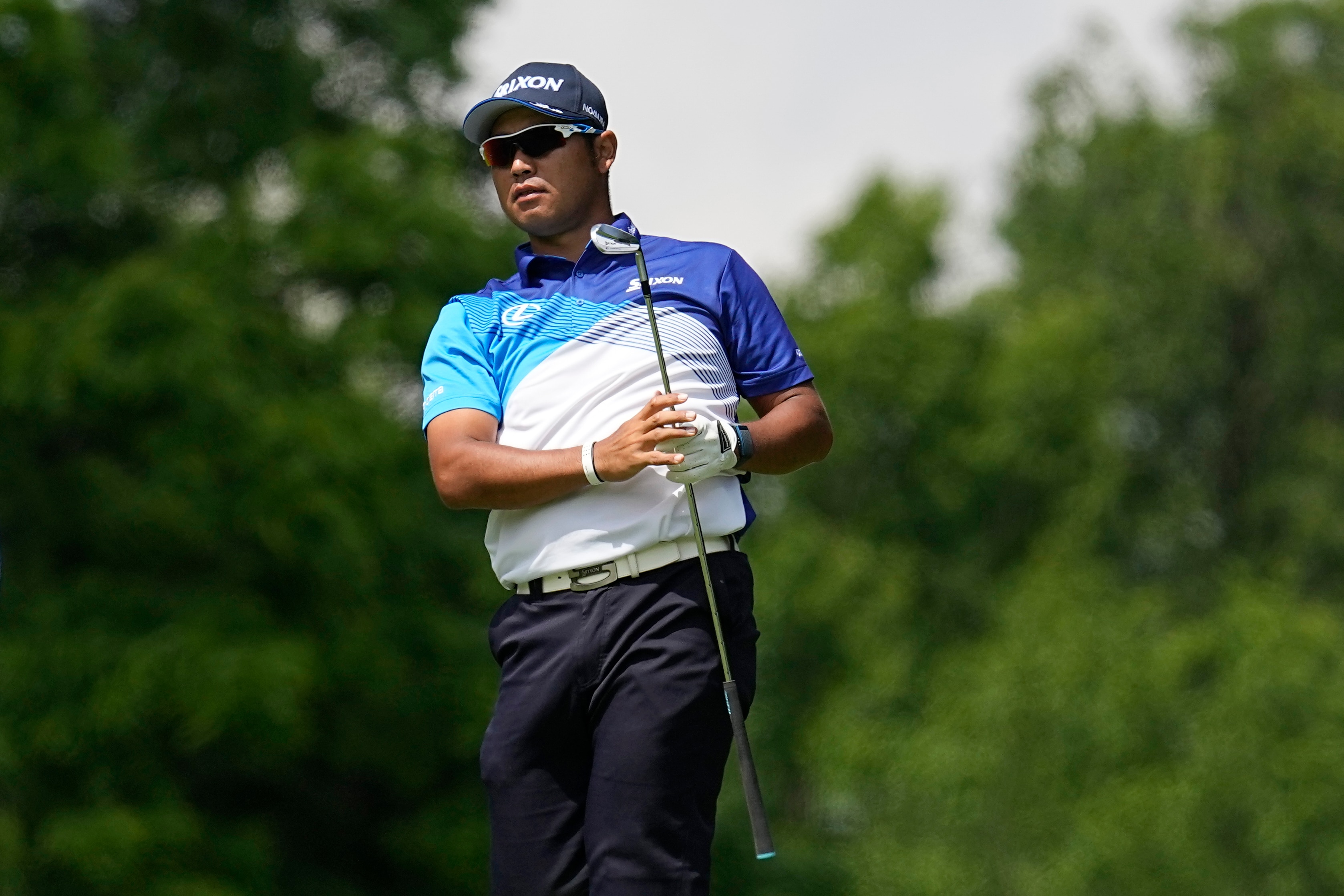 Hideki Matsuyama, of Japan, watches his shot on the ninth fairway during the first round of the Memorial golf tournament, Thursday, June 2, 2022, in Dublin, Ohio. (AP Photo/Darron Cummings)