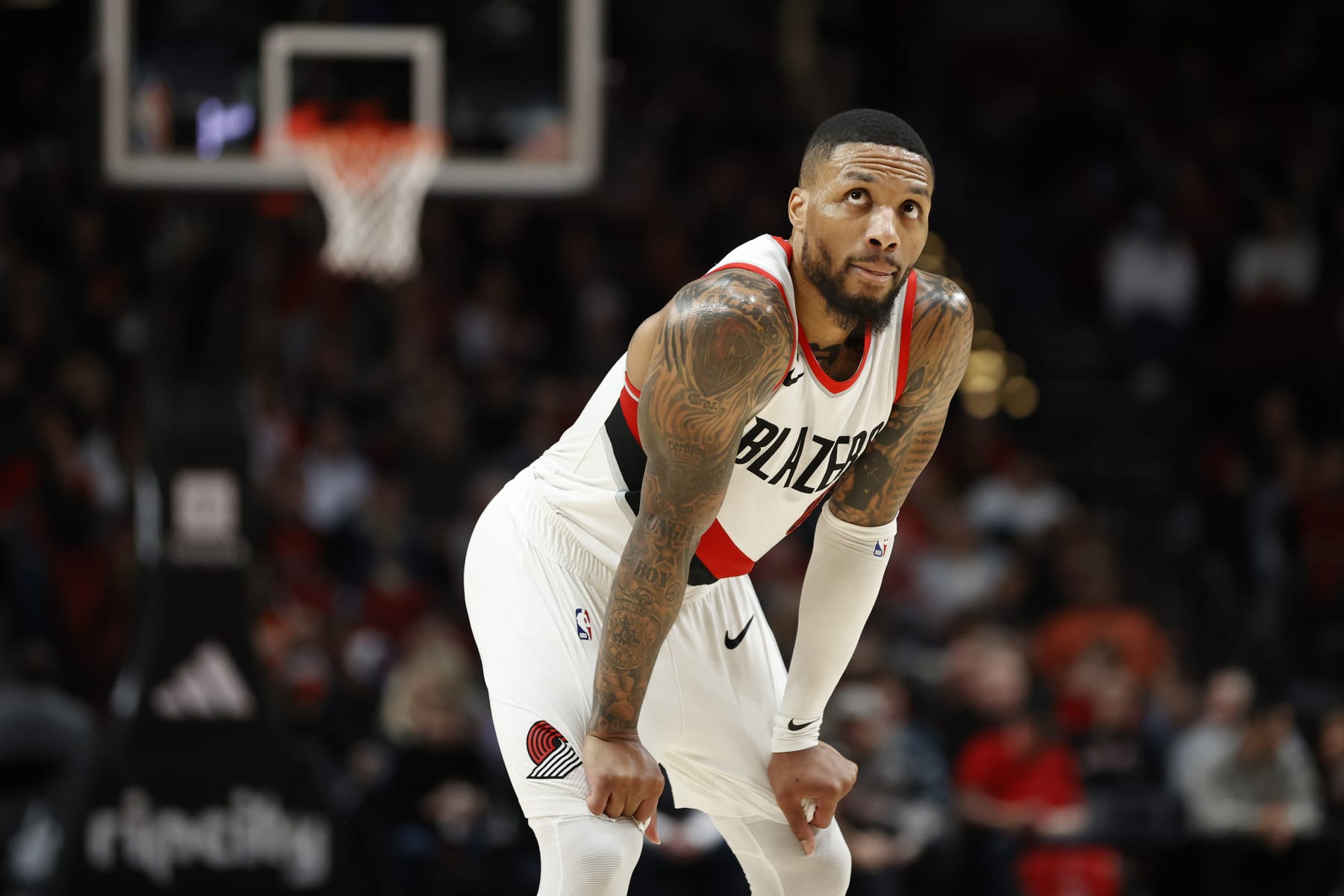 PORTLAND, OREGON - JANUARY 23: Damian Lillard #0 of the Portland Trail Blazers reacts during the third quarter \a at Moda Center on January 23, 2023 in Portland, Oregon. NOTE TO USER: User expressly acknowledges and agrees that, by downloading and/or using this photograph, User is consenting to the terms and conditions of the Getty Images License Agreement. (Photo by Steph Chambers/Getty Images)