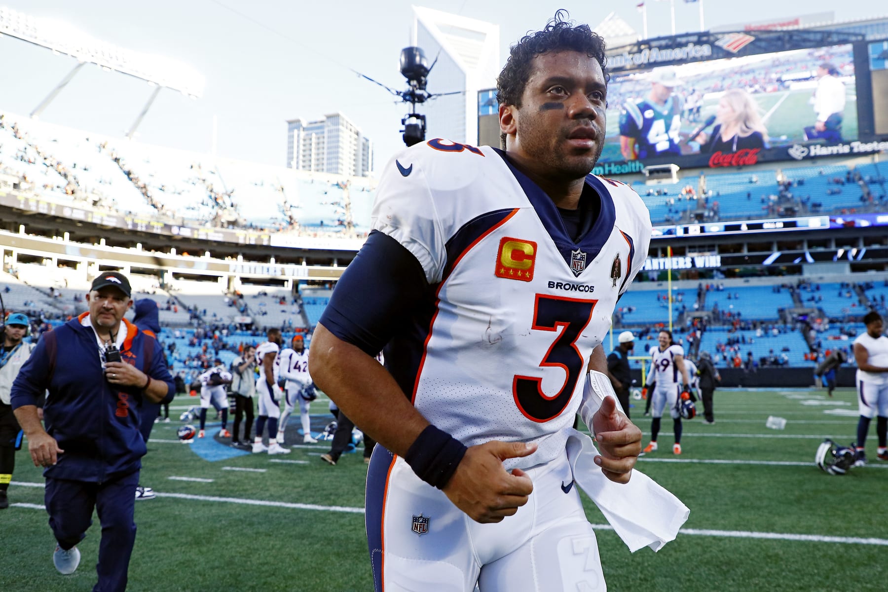 CHARLOTTE, NORTH CAROLINA - NOVEMBER 27: Russell Wilson #3 of the Denver Broncos walks off the field after a game against the Carolina Panthers at Bank of America Stadium on November 27, 2022 in Charlotte, North Carolina. (Photo by Jared C. Tilton/Getty Images)