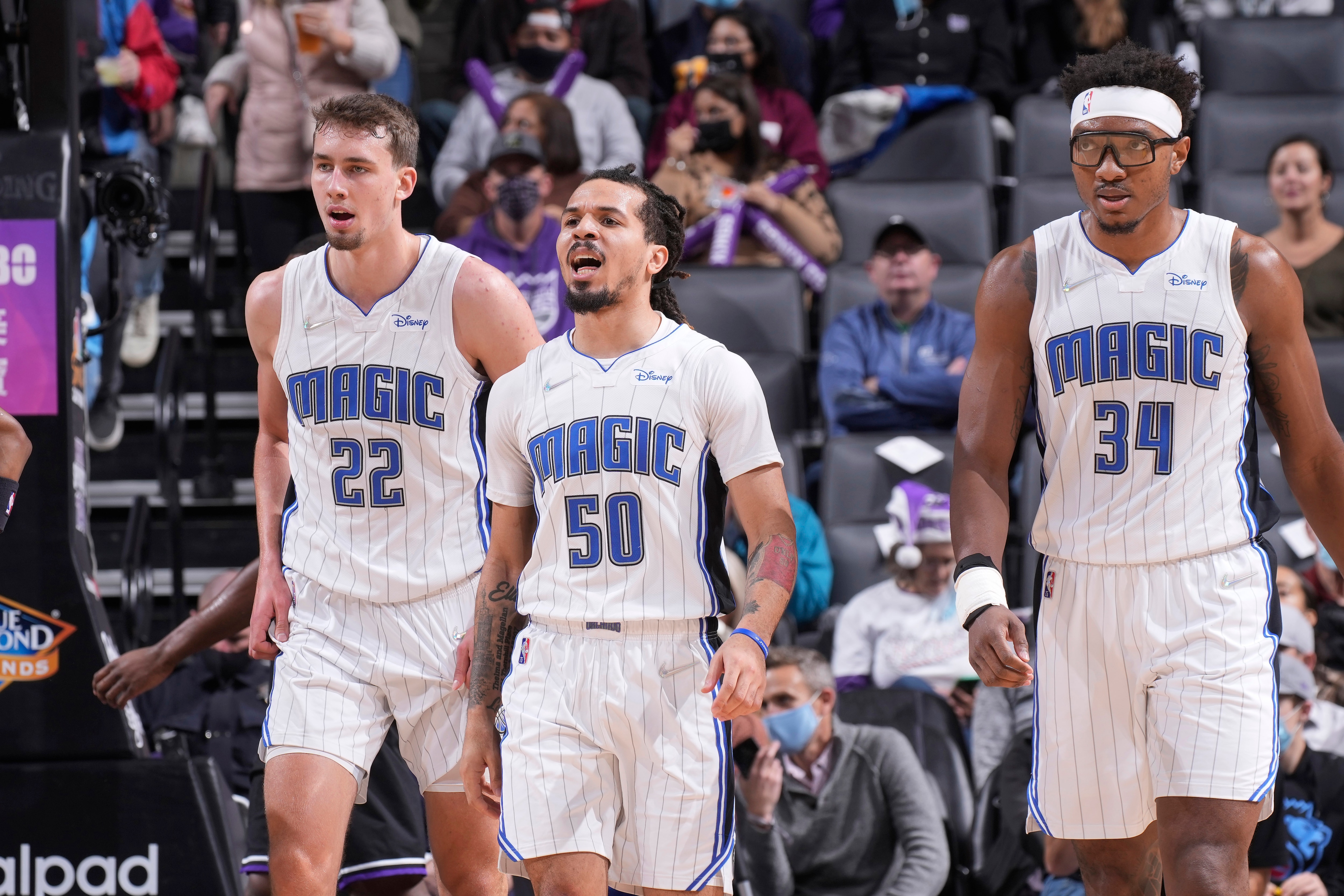 SACRAMENTO, CA - DECEMBER 8: Franz Wagner #22, Cole Anthony #50 and Wendell Carter Jr. #34 of the Orlando Magic face the Sacramento Kings on December 8, 2021 at Golden 1 Center in Sacramento, California. NOTE TO USER: User expressly acknowledges and agrees that, by downloading and or using this photograph, User is consenting to the terms and conditions of the Getty Images Agreement. Mandatory Copyright Notice: Copyright 2021 NBAE (Photo by Rocky Widner/NBAE via Getty Images)