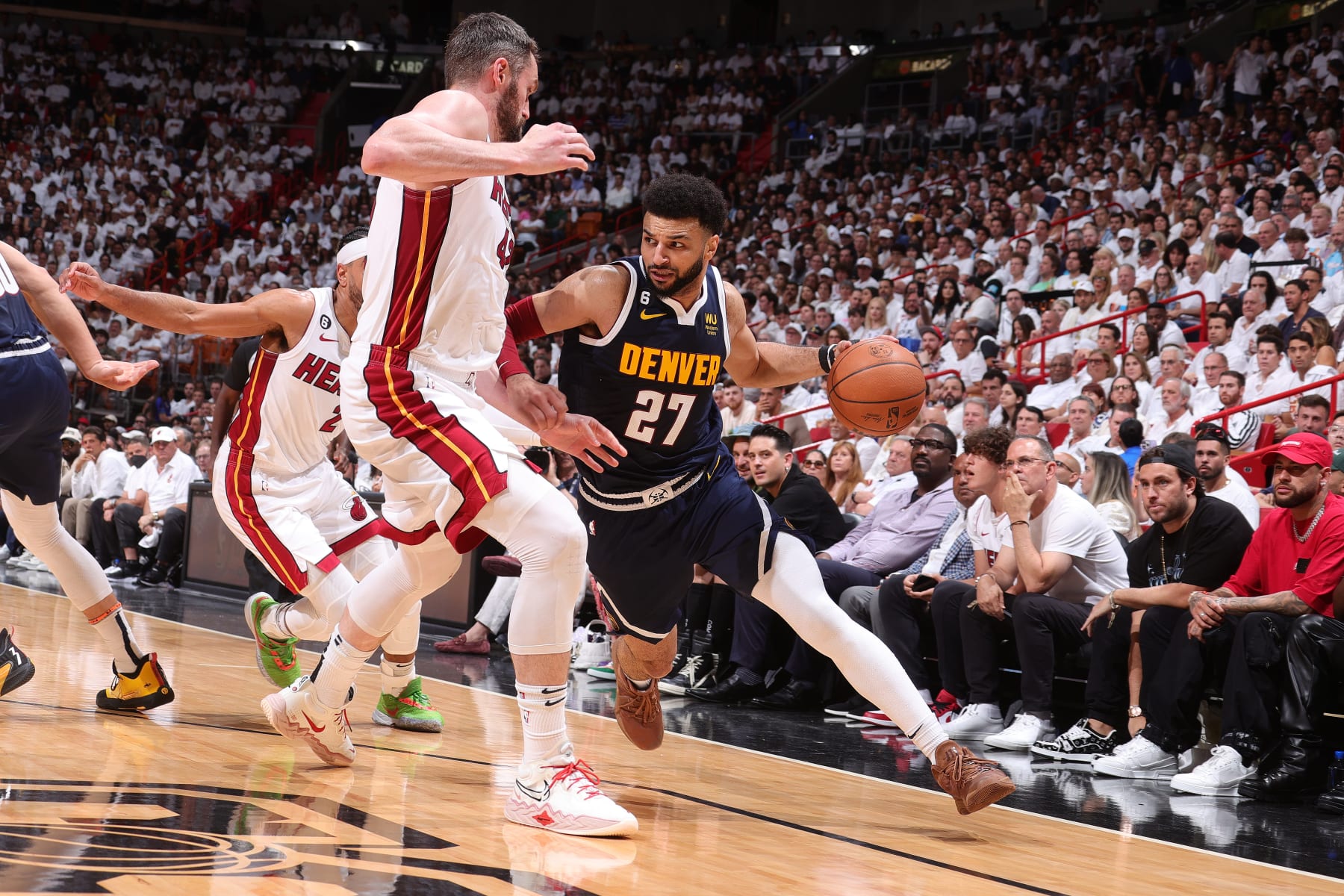 MIAMI, FL - JUNE 9: Jamal Murray #27 of the Denver Nuggets dribbles the ball during Game Four of the 2023 NBA Finals against the Miami Heat on June 9, 2023 at Kaseya Center in Miami, Florida. NOTE TO USER: User expressly acknowledges and agrees that, by downloading and or using this Photograph, user is consenting to the terms and conditions of the Getty Images License Agreement. Mandatory Copyright Notice: Copyright 2023 NBAE (Photo by Nathaniel S. Butler/NBAE via Getty Images)