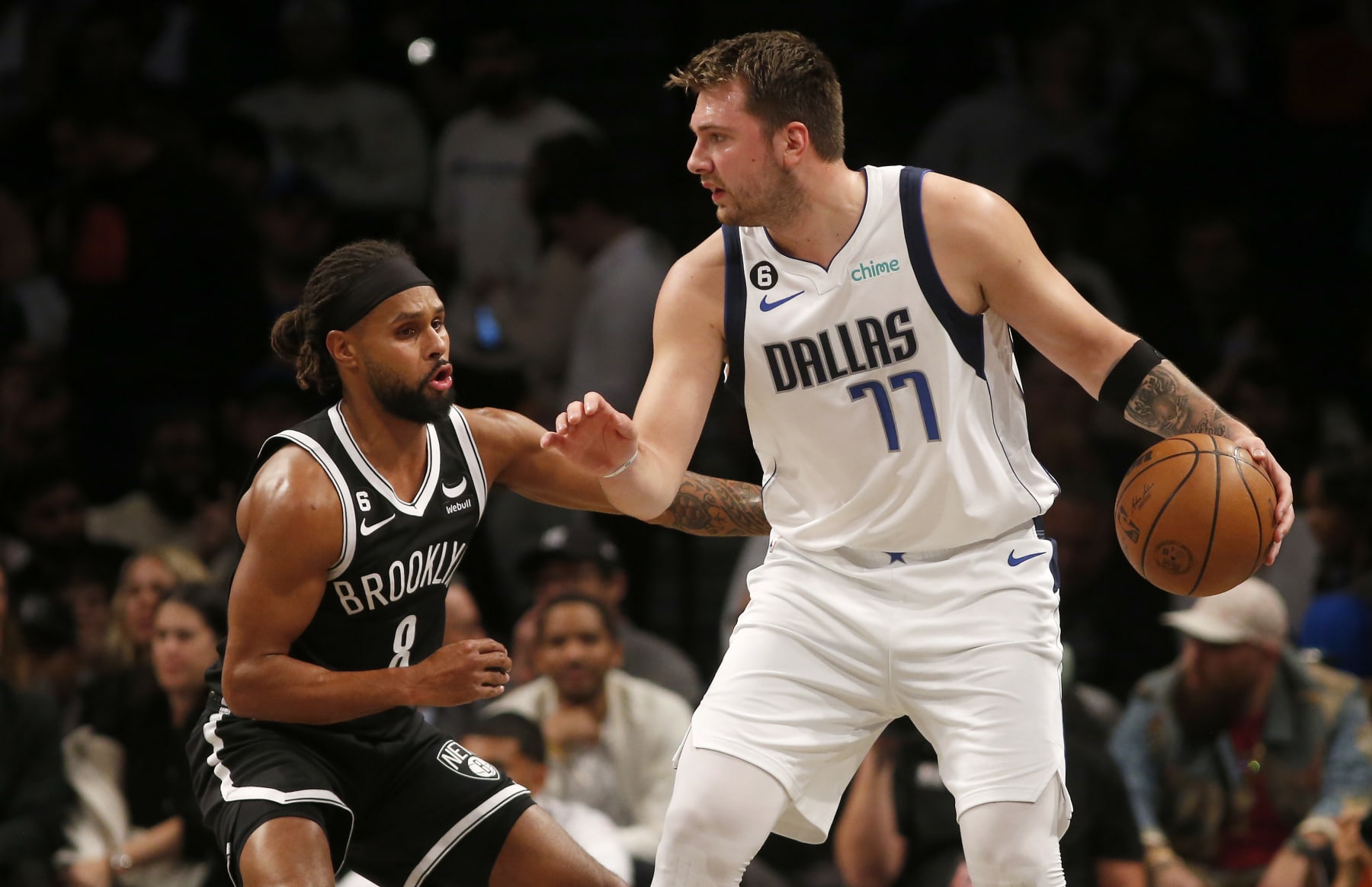 NEW YORK, NEW YORK - OCTOBER 27: (NEW YORK DAILIES OUT)  Luka Doncic #77 of the Dallas Mavericks in action against Patty Mills #8 of the Brooklyn Nets at Barclays Center on October 27, 2022 in New York City. The Mavericks defeated the Nets 129-125 in overtime. NOTE TO USER: User expressly acknowledges and agrees that, by downloading and or using this photograph, User is consenting to the terms and conditions of the Getty Images License Agreement. (Photo by Jim McIsaac/Getty Images)