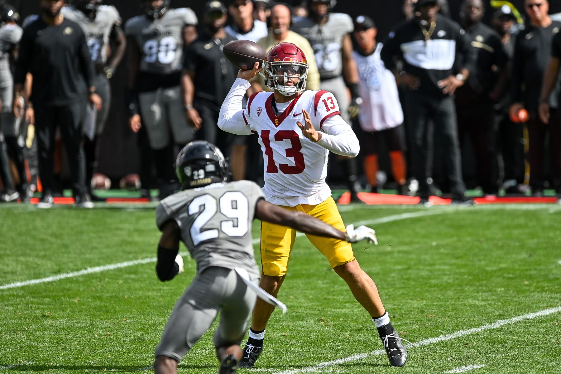 BOULDER, CO - SEPTEMBER 30:  Quarterback Caleb Williams #13 of the USC Trojans passes for a third quarter touchdown against the Colorado Buffaloes at Folsom Field on September 30, 2023 in Boulder, Colorado. (Photo by Dustin Bradford/Getty Images)