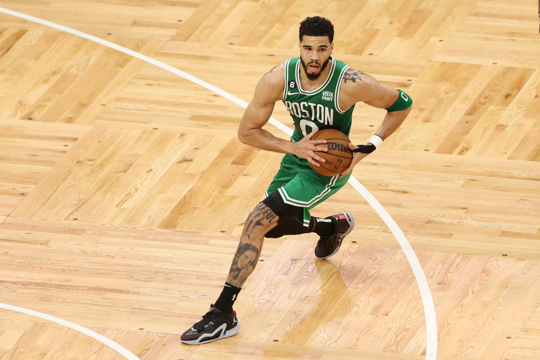 BOSTON, MASSACHUSETTS - MAY 29: Jayson Tatum #0 of the Boston Celtics handles the ball during the second quarter against the Miami Heat in game seven of the Eastern Conference Finals at TD Garden on May 29, 2023 in Boston, Massachusetts. NOTE TO USER: User expressly acknowledges and agrees that, by downloading and or using this photograph, User is consenting to the terms and conditions of the Getty Images License Agreement. (Photo by Adam Glanzman/Getty Images)