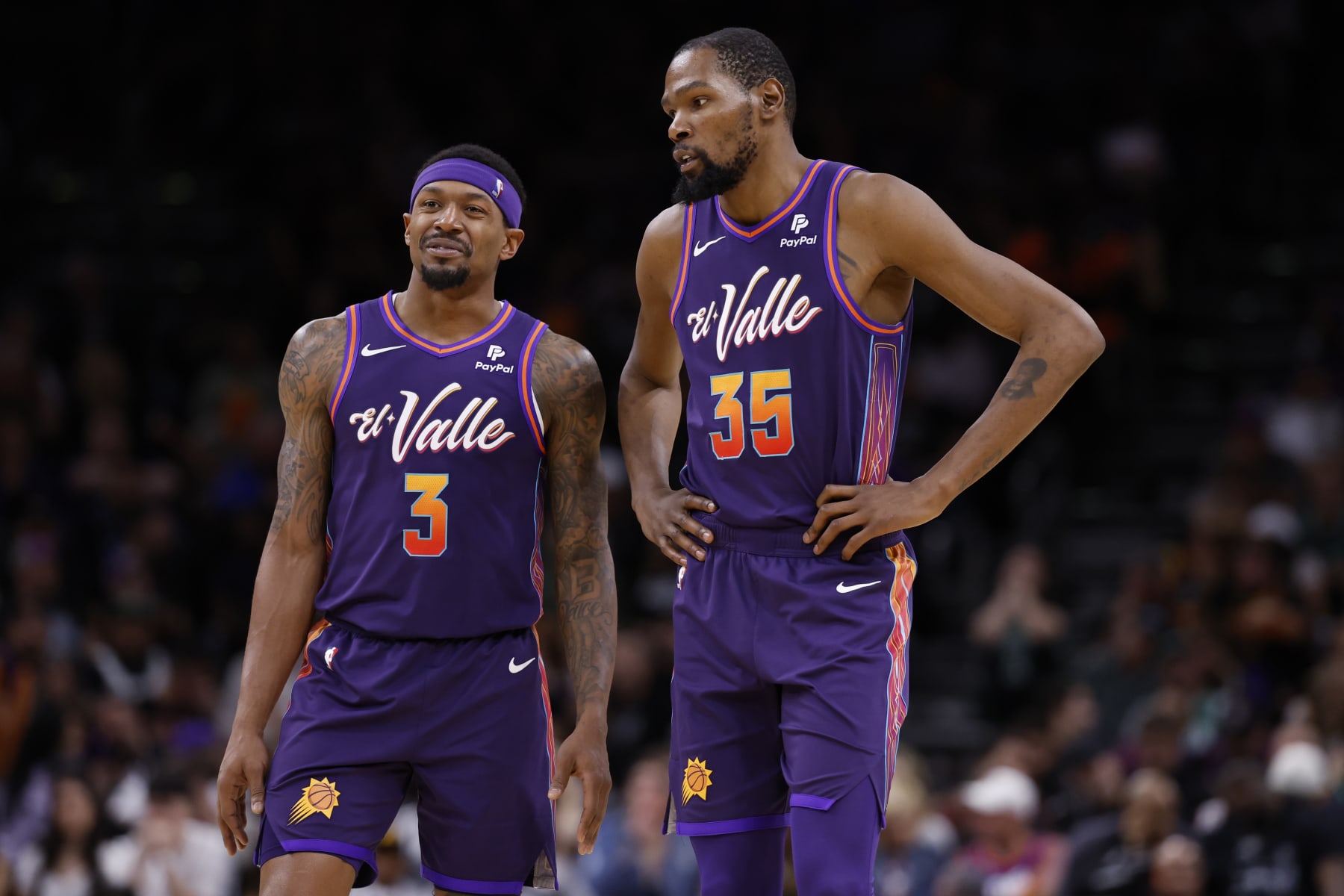PHOENIX, ARIZONA - MARCH 09: Kevin Durant #35 talks with Bradley Beal #3 of the Phoenix Suns during the game against the Boston Celtics at Footprint Center on March 09, 2024 in Phoenix, Arizona. The Celtics defeated the Suns 117-107. NOTE TO USER: User expressly acknowledges and agrees that, by downloading and or using this photograph, User is consenting to the terms and conditions of the Getty Images License Agreement.  (Photo by Chris Coduto/Getty Images)