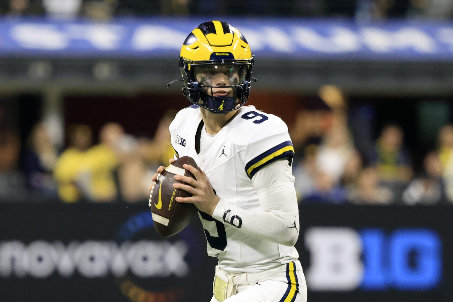 INDIANAPOLIS, INDIANA - DECEMBER 02: J.J. McCarthy #9 of the Michigan Wolverines drops back to pass in the game against the Iowa Hawkeyes during the Big Ten Championship at Lucas Oil Stadium on December 02, 2023 in Indianapolis, Indiana. (Photo by Justin Casterline/Getty Images)