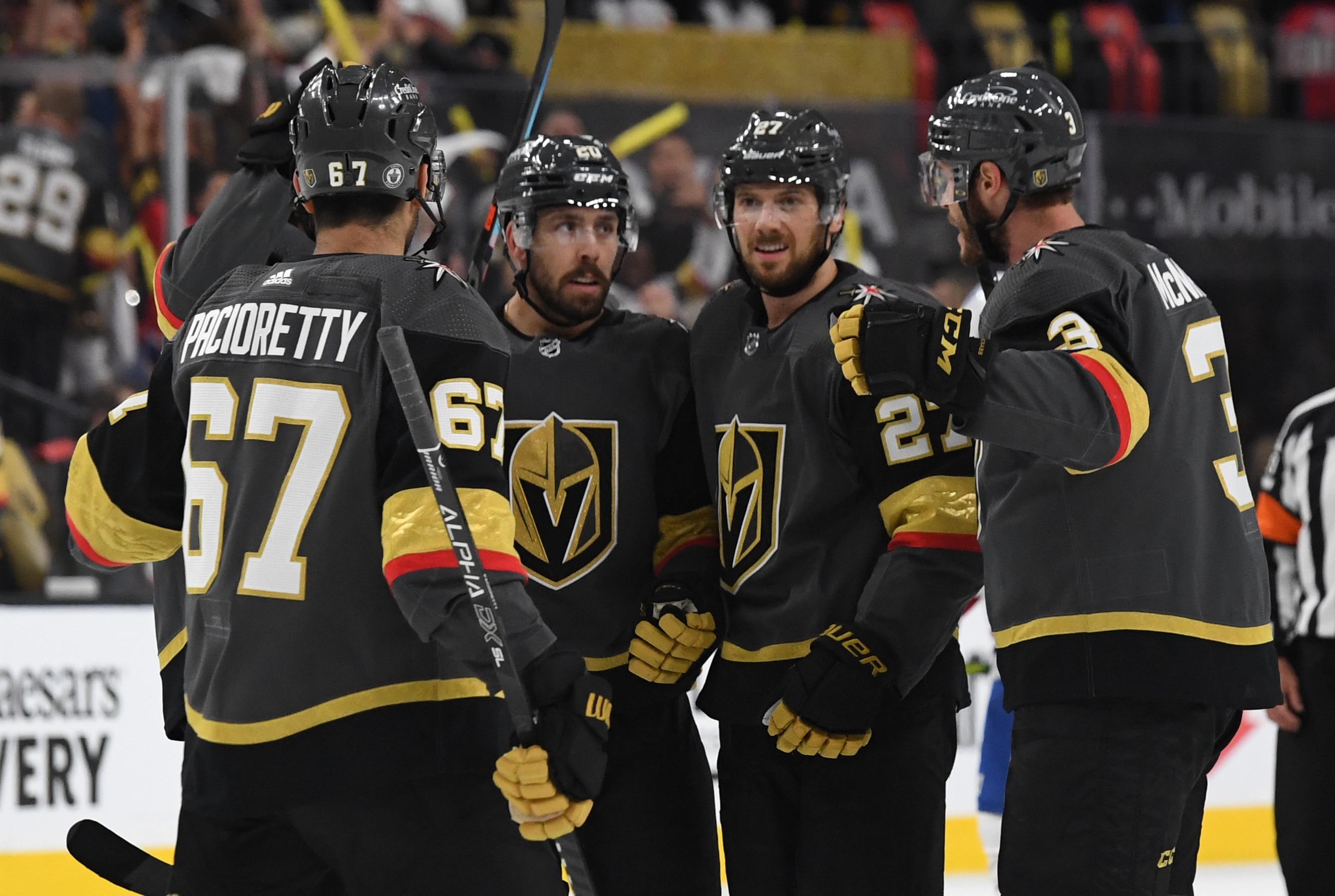 LAS VEGAS, NEVADA - JUNE 14: Shea Theodore #27 of the Vegas Golden Knights celebrates after scoring a goal during the first period against the Montreal Canadiens in Game One of the Stanley Cup Semifinals at T-Mobile Arena on June 14, 2021 in Las Vegas, Nevada. (Photo by David Becker/NHLI via Getty Images)