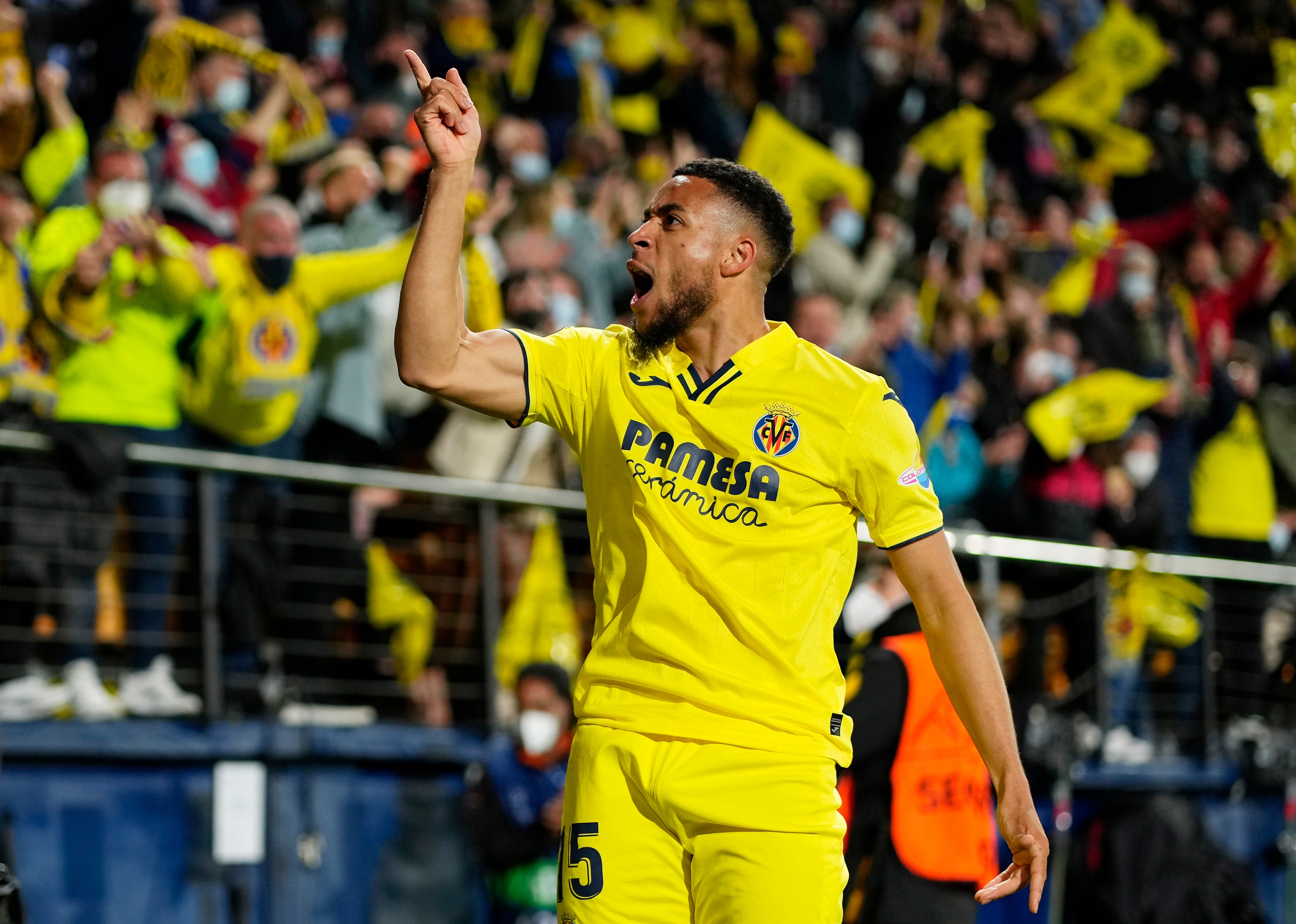 VILLARREAL, SPAIN - APRIL 06: Arnaut Danjuma of Villarreal CF celebrates after scoring their team's first goal during the UEFA Champions League Quarter Final Leg One match between Villarreal CF and Bayern München at Estadio de la Ceramica on April 06, 2022 in Villarreal, Spain. (Photo by Aitor Alcalde - UEFA/UEFA via Getty Images)