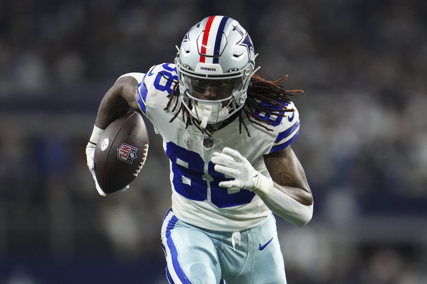 ARLINGTON, TX - DECEMBER 04: CeeDee Lamb #88 of the Dallas Cowboys runs the ball against the Indianapolis Colts at AT&T Stadium on December 4, 2022 in Arlington, Texas. (Photo by Cooper Neill/Getty Images)
