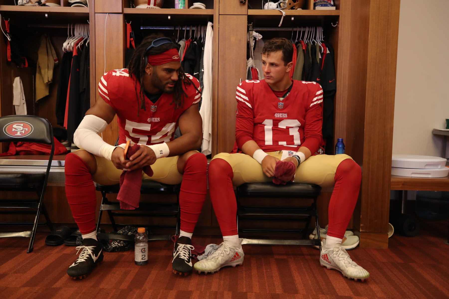 SANTA CLARA, CA - AUGUST 25: Fred Warner #54 and Brock Purdy #13 of the San Francisco 49ers in the locker room before the game against the Los Angeles Chargers at Levi's Stadium on August 25, 2023 in Santa Clara, California. The Chargers defeated the 49ers 23-12. (Photo by Michael Zagaris/San Francisco 49ers/Getty Images)