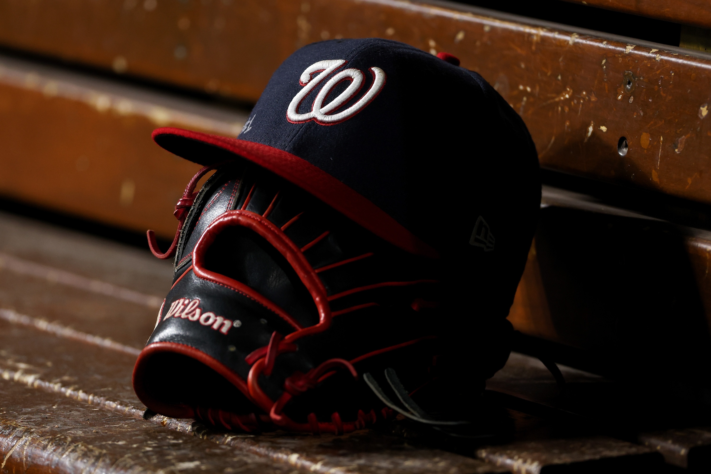 CINCINNATI, OHIO - SEPTEMBER 23: A detail view of a Washington Nationals hat in the dugout during the game against the Cincinnati Reds at Great American Ball Park on September 23, 2021 in Cincinnati, Ohio. (Photo by Dylan Buell/Getty Images)