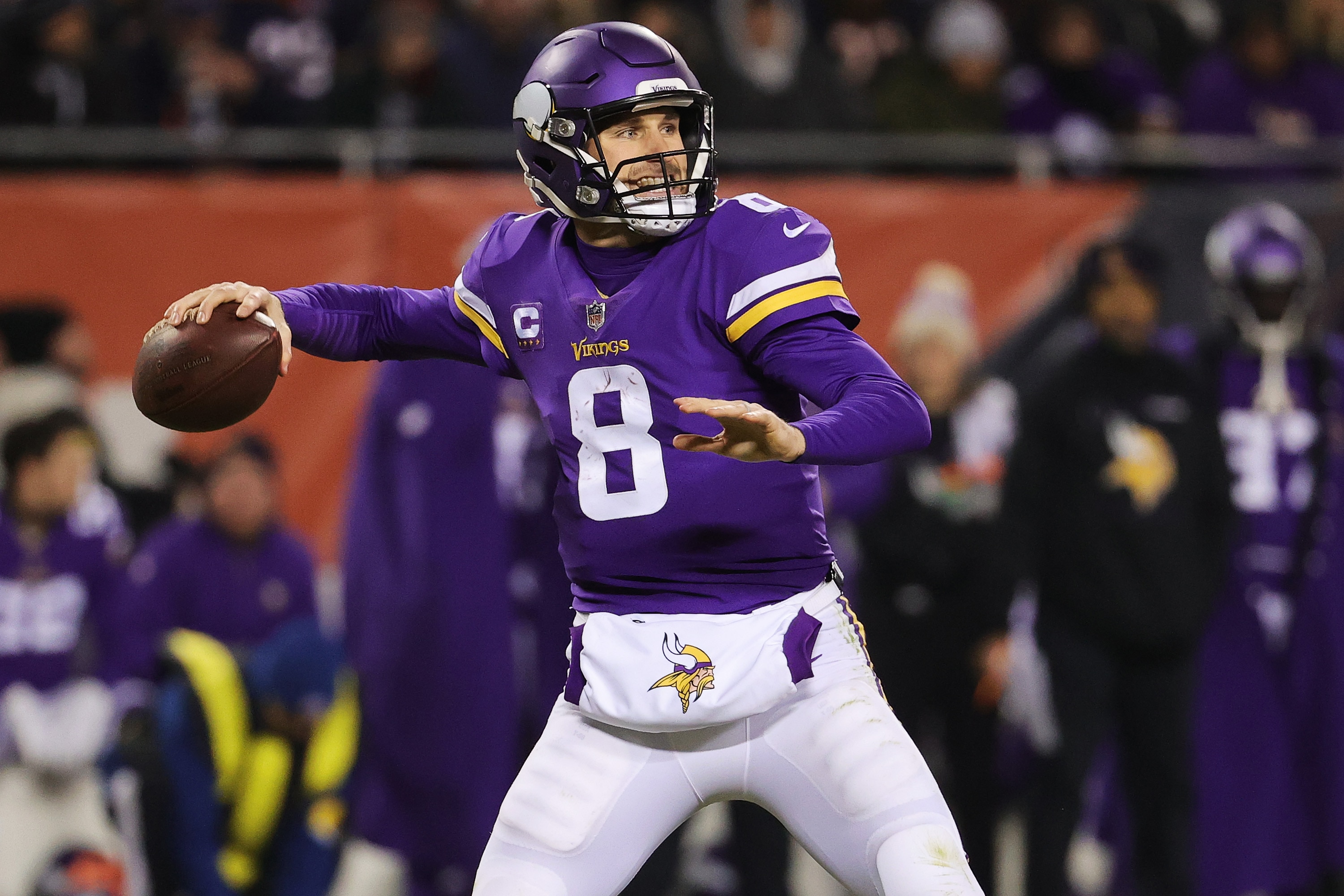 CHICAGO, ILLINOIS - DECEMBER 20: Kirk Cousins #8 of the Minnesota Vikings looks to pass during the first half against the Chicago Bears at Soldier Field on December 20, 2021 in Chicago, Illinois. (Photo by Jonathan Daniel/Getty Images)