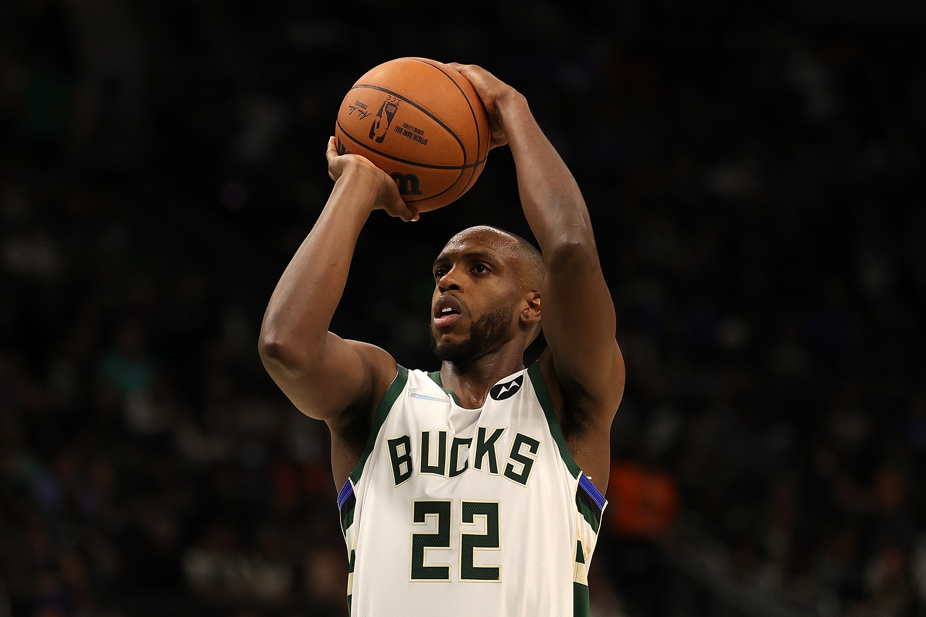 MILWAUKEE, WISCONSIN - OCTOBER 19: Khris Middleton #22 of the Milwaukee Bucks shoots a free throw against the Brooklyn Nets during the season opener at the Fiserv Forum on October 19, 2021 in Milwaukee, Wisconsin. NOTE TO USER: User expressly acknowledges and agrees that, by downloading and or using this photograph, User is consenting to the terms and conditions of the Getty Images License Agreement. (Photo by Stacy Revere/Getty Images)