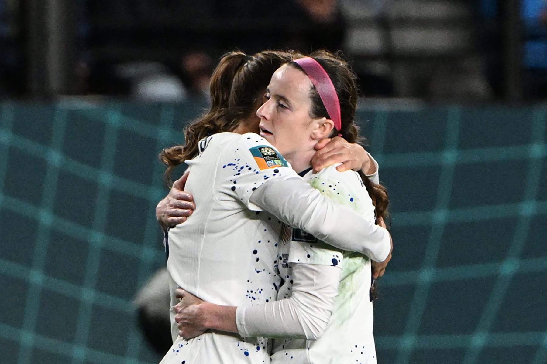 USA's midfielder #16 Rose Lavelle (R) and teammates react at the end of the Australia and New Zealand 2023 Women's World Cup Group E football match between Portugal and the United States at Eden Park in Auckland on August 1, 2023. (Photo by Saeed KHAN / AFP) (Photo by SAEED KHAN/AFP via Getty Images)