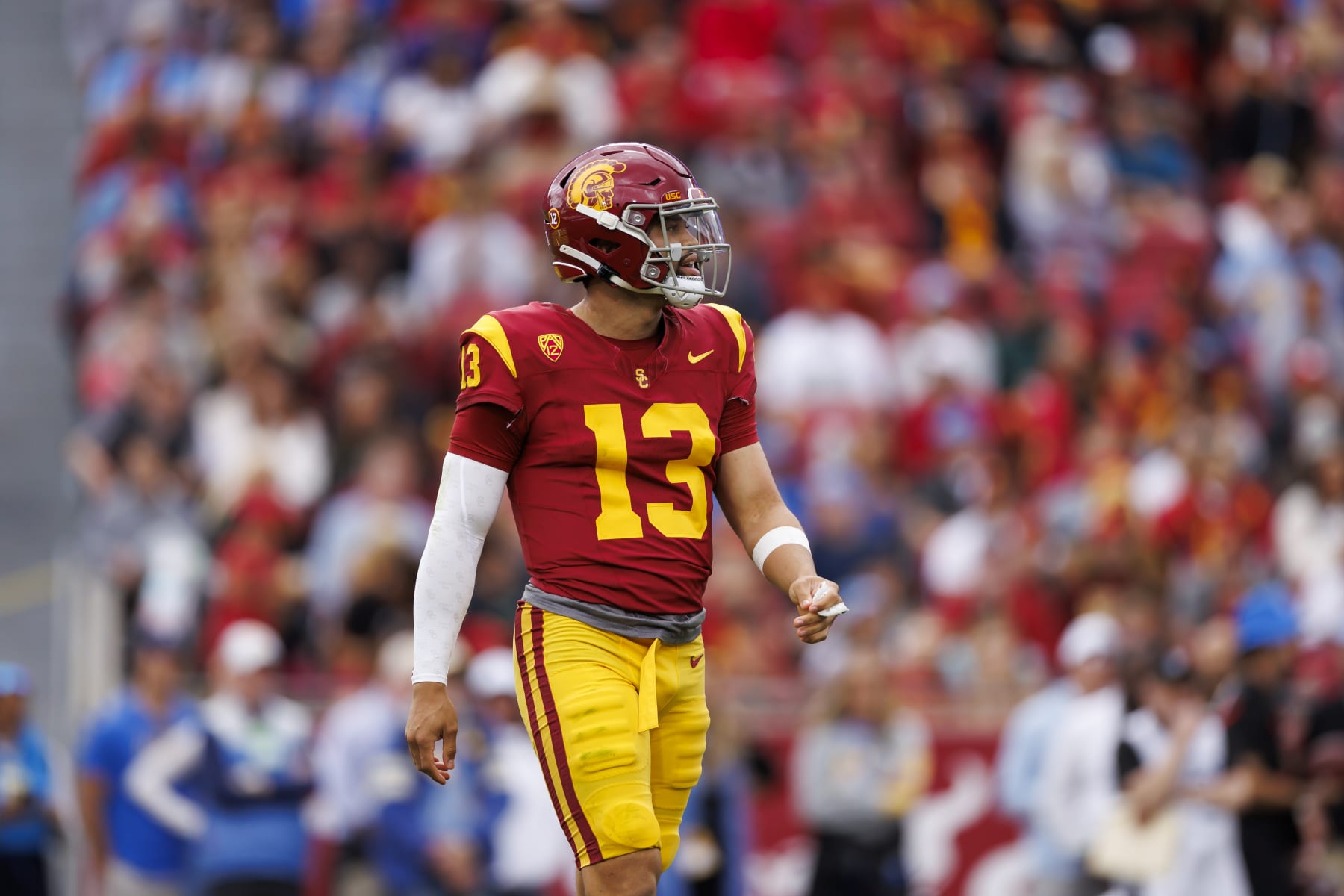 LOS ANGELES, CALIFORNIA - NOVEMBER 18: Caleb Williams #13 of the USC Trojans looks on during the first half of a game against the UCLA Bruins at United Airlines Field at the Los Angeles Memorial Coliseum on November 18, 2023 in Los Angeles, California. (Photo by Ryan Kang/Getty Images)