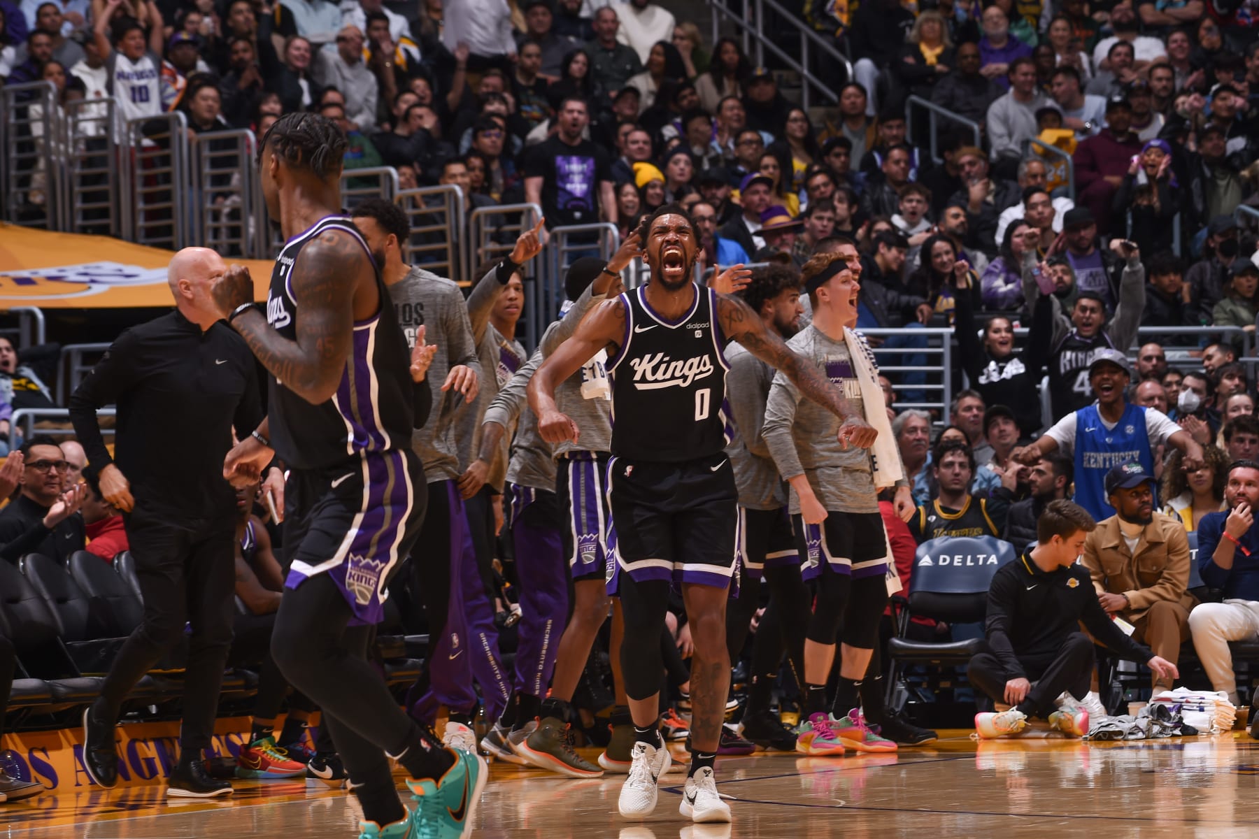 LOS ANGELES, CA - MARCH 6: Malik Monk #0 of the Sacramento Kings celebrates during the game against the Los Angeles Lakers on March 6, 2024 NBAE at Crypto.Com Arena in Los Angeles, California. NOTE TO USER: User expressly acknowledges and agrees that, by downloading and/or using this Photograph, user is consenting to the terms and conditions of the Getty Images License Agreement. Mandatory Copyright Notice: Copyright 2024 NBAE (Photo by Juan Ocampo/NBAE via Getty Images)