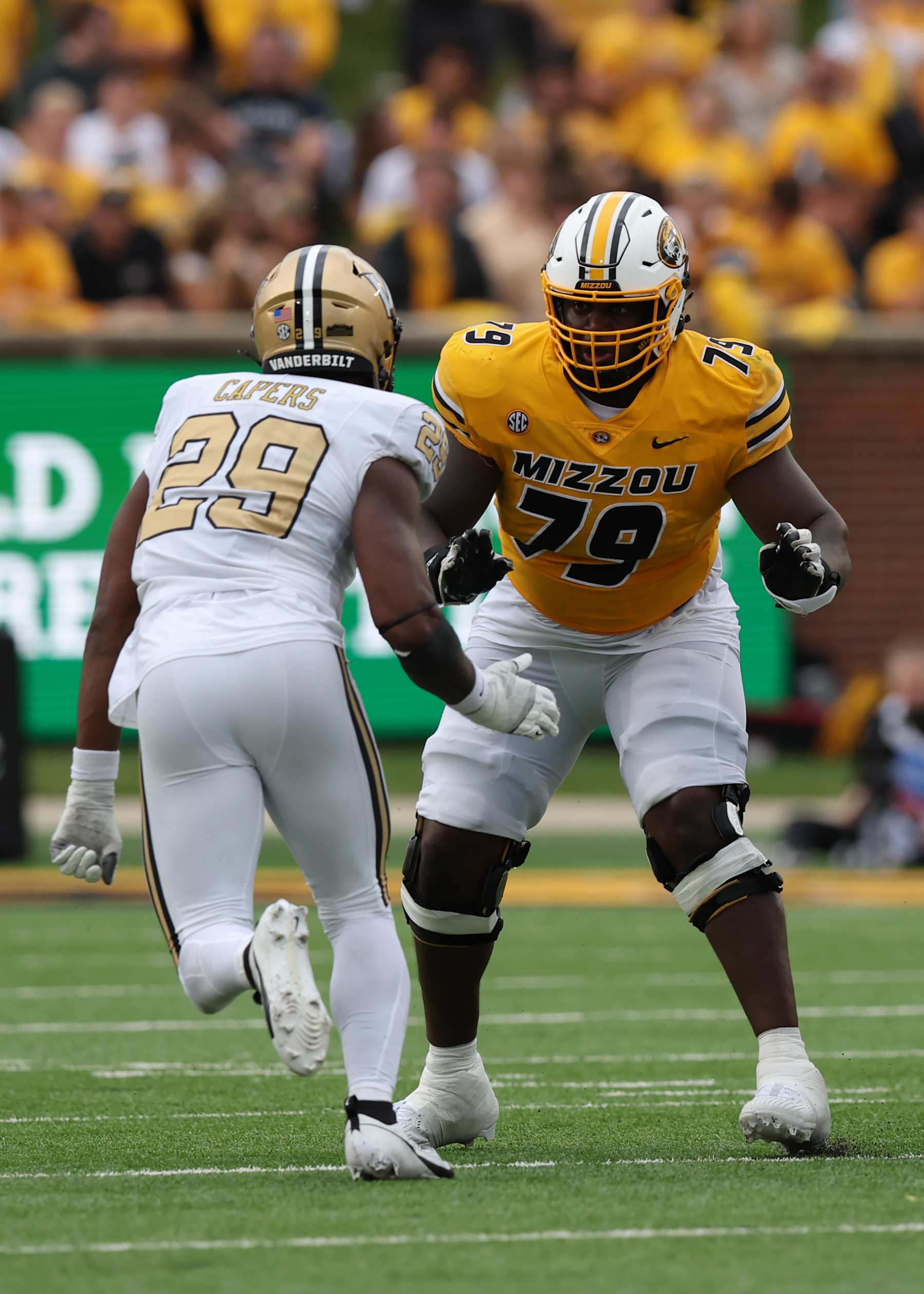 COLUMBIA, MO - SEPTEMBER 21: Missouri Tigers offensive lineman Armand Membou (79) blocks Vanderbilt Commodores edge Miles Capers (29) in the third quarter of an SEC football game between the Vanderbilt Commodores and Missouri Tigers on September 21, 2024 at Memorial Stadium in Columbia, MO. (Photo by Scott Winters/Icon Sportswire via Getty Images)