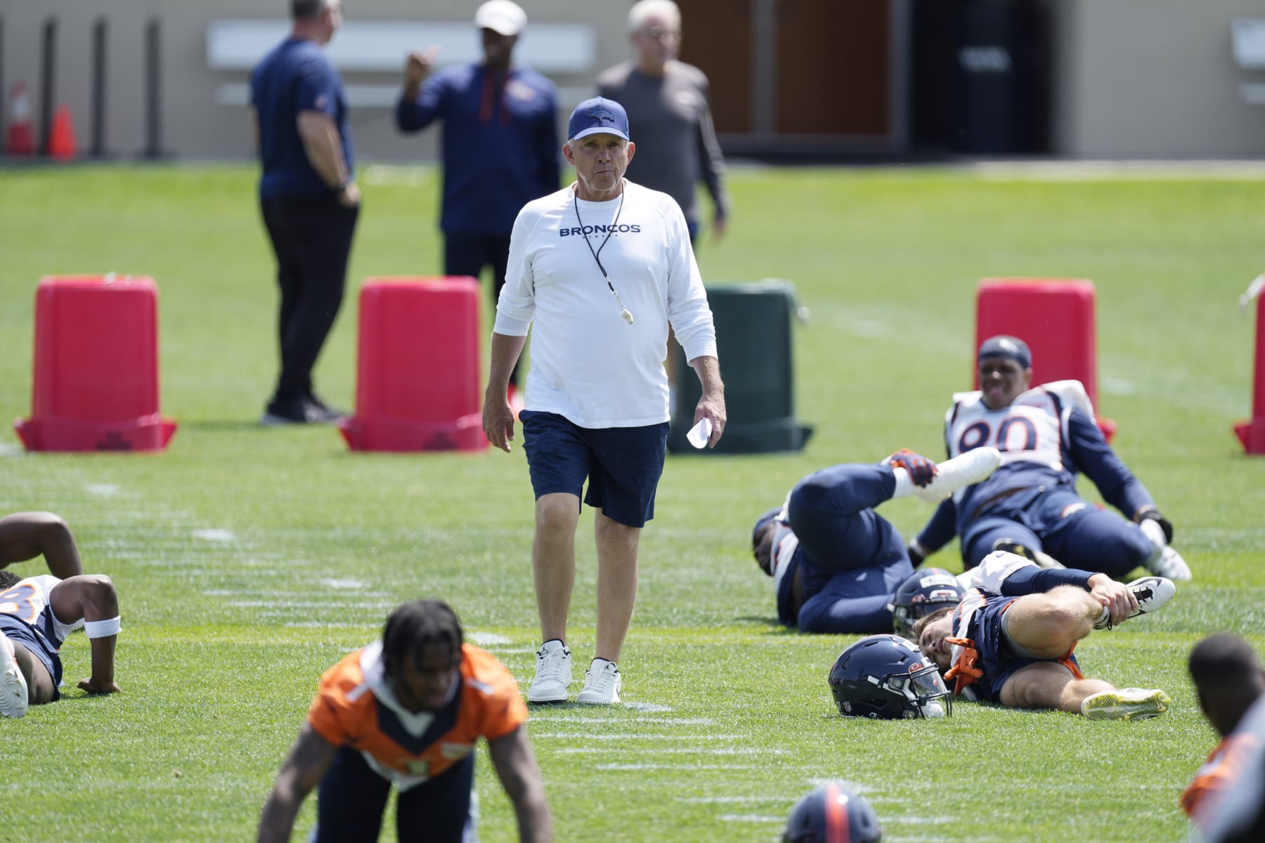 Denver Broncos head coach Sean Payton takes part in drills during a mandatory NFL football minicamp at the Broncos' headquarters Wednesday, June 14, 2023, in Centennial, Colo. (AP Photo/David Zalubowski)
