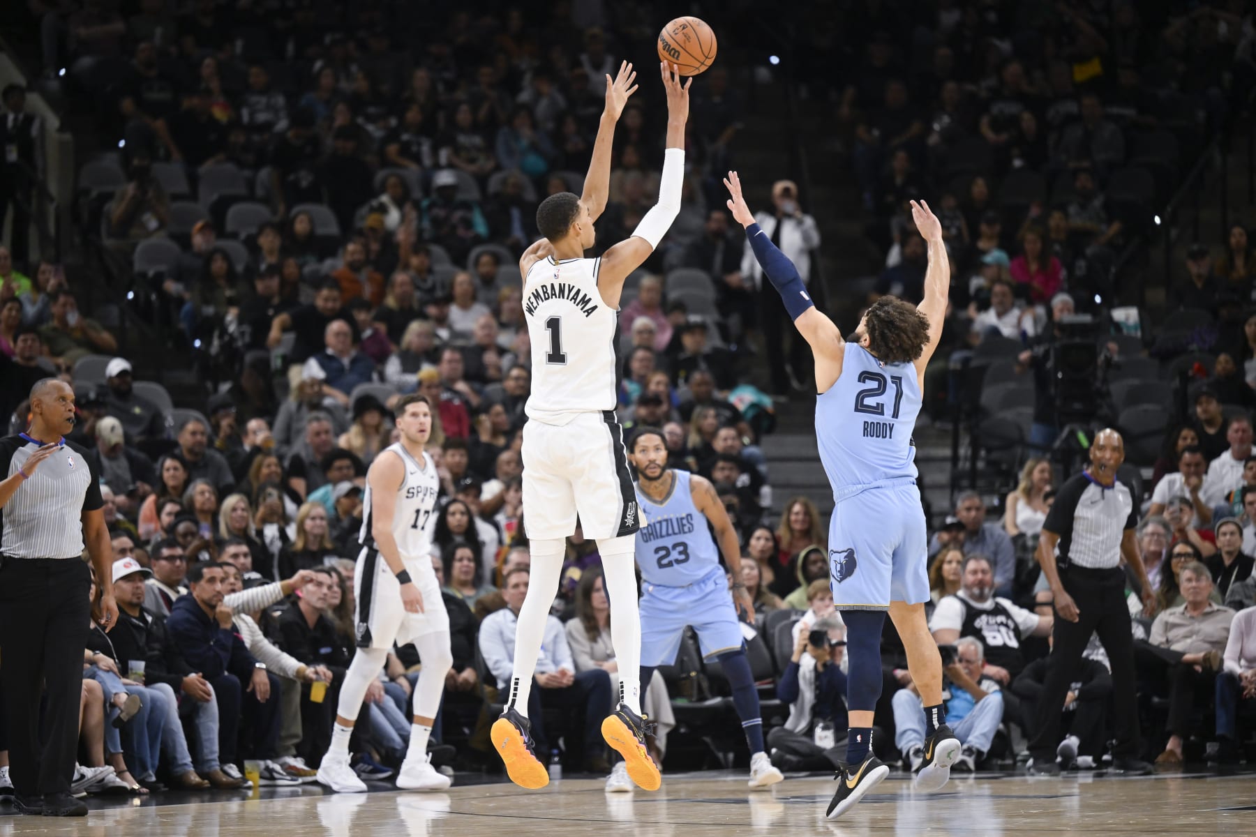 San Antonio Spurs' Victor Wembanyama (1) shoots during the second half of an NBA basketball game against the Memphis Grizzlies, Saturday, Nov. 18, 2023, in San Antonio. (AP Photo/Darren Abate)