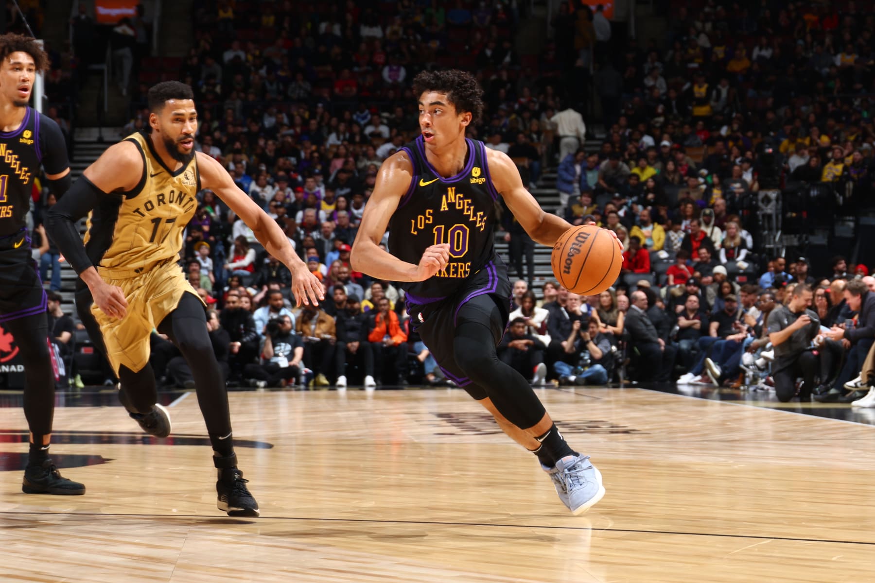 TORONTO, CANADA - APRIL 2: Max Christie #10 of the Los Angeles Lakers dribbles the ball during the game against the Toronto Raptors on April 2, 2024 at the Scotiabank Arena in Toronto, Ontario, Canada.  NOTE TO USER: User expressly acknowledges and agrees that, by downloading and or using this Photograph, user is consenting to the terms and conditions of the Getty Images License Agreement.  Mandatory Copyright Notice: Copyright 2023 NBAE (Photo by Vaughn Ridley/NBAE via Getty Images)