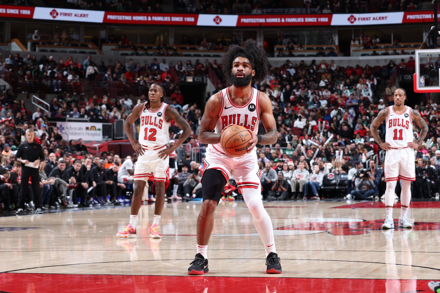 CHICAGO, IL - MARCH 23: Coby White #0 of the Chicago Bulls prepares to shoot a free throw during the game against the Boston Celtics on March 23, 2024 at United Center in Chicago, Illinois. NOTE TO USER: User expressly acknowledges and agrees that, by downloading and or using this photograph, User is consenting to the terms and conditions of the Getty Images License Agreement. Mandatory Copyright Notice: Copyright 2024 NBAE (Photo by Jeff Haynes/NBAE via Getty Images)