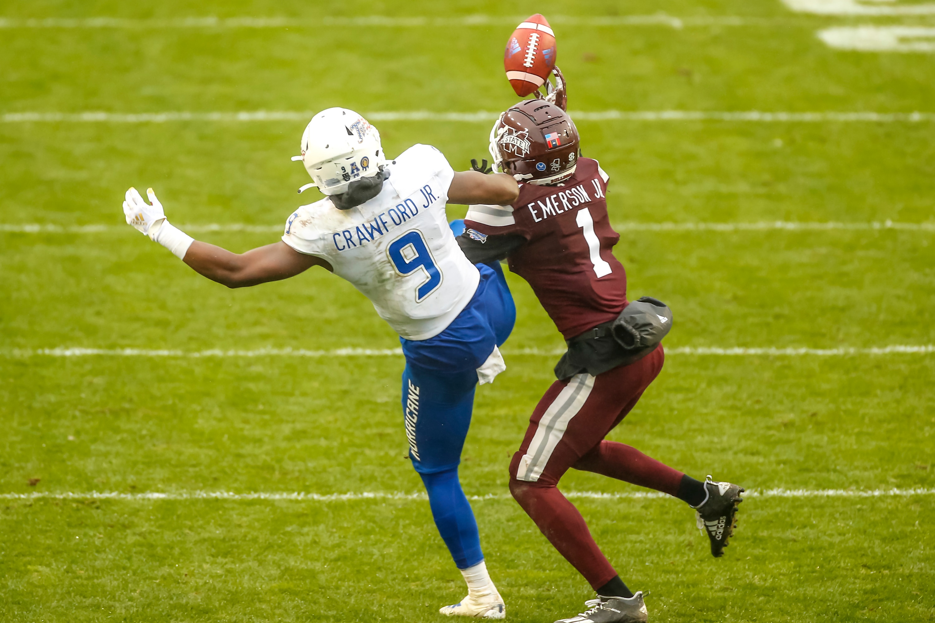 FORT WORTH, TX - DECEMBER 31: Tulsa Golden Hurricane wide receiver Sam Crawford Jr. (9) and Mississippi State Bulldogs cornerback Martin Emerson (1) battle for the football during the Armed Forces Bowl game between the Tulsa Golden Hurricane and the Mississippi State Bulldogs on December 31, 2020 at Amon G. Carter Stadium in Fort Worth, Texas. (Photo by Matthew Pearce/Icon Sportswire via Getty Images)