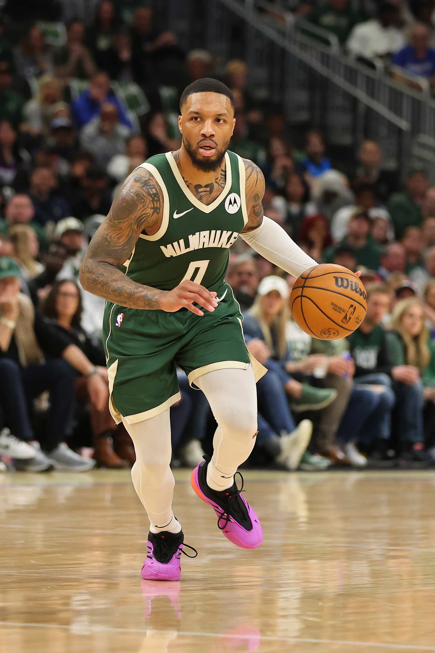 MILWAUKEE, WISCONSIN - APRIL 21: Damian Lillard #0 of the Milwaukee Bucks handles the ball during game one of the Eastern Conference First Round Playoffs against the Indiana Pacers at Fiserv Forum on April 21, 2024 in Milwaukee, Wisconsin.  NOTE TO USER: User expressly acknowledges and agrees that, by downloading and or using this photograph, User is consenting to the terms and conditions of the Getty Images License Agreement. (Photo by Stacy Revere/Getty Images)