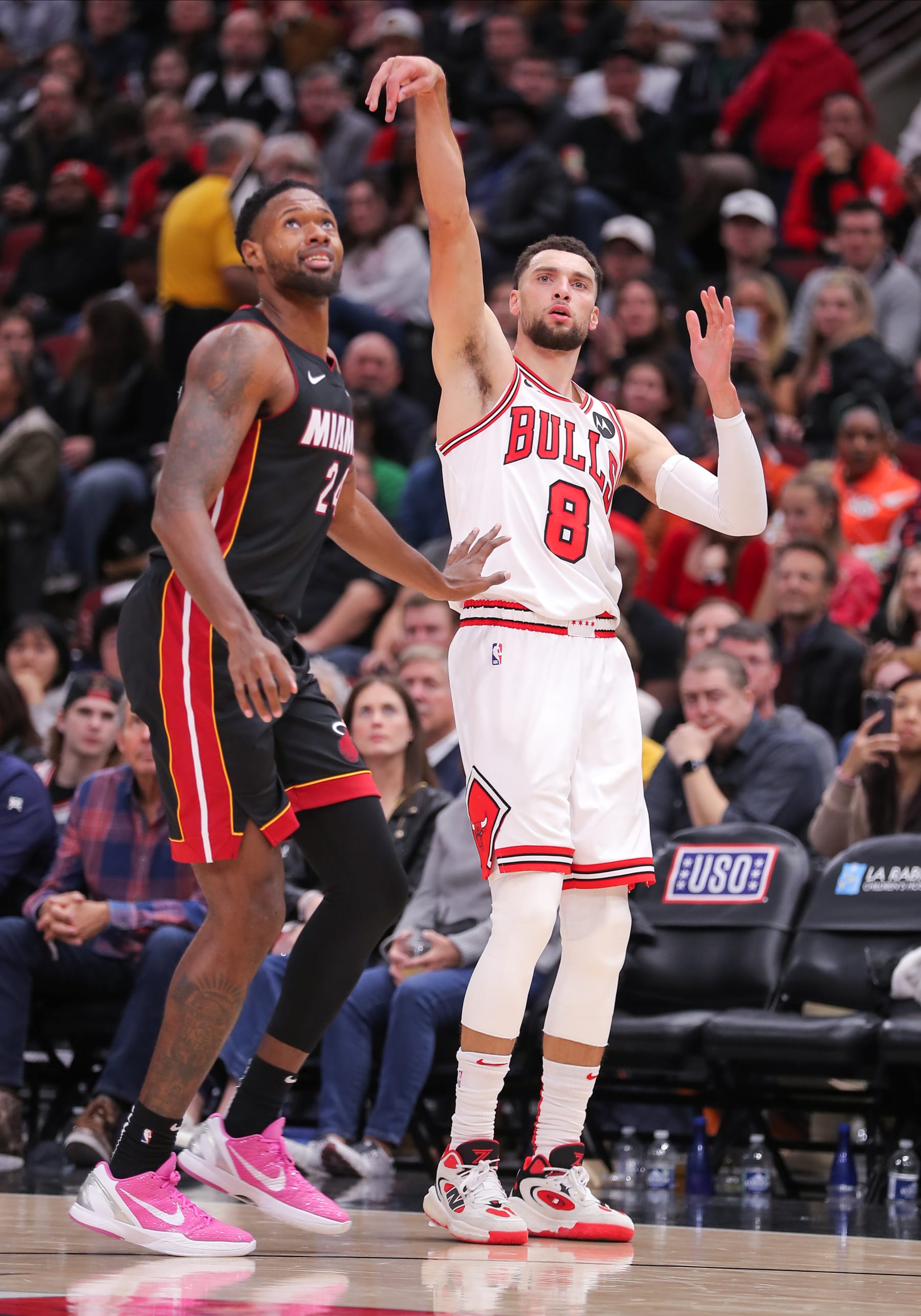 CHICAGO, IL - NOVEMBER 20: Jimmy Butler #22 of the Miami Heat and Zach LaVine #8 of the Chicago Bulls looks on during the second half at the United Center on November 20, 2023 in Chicago, Illinois. (Photo by Melissa Tamez/Icon Sportswire via Getty Images)