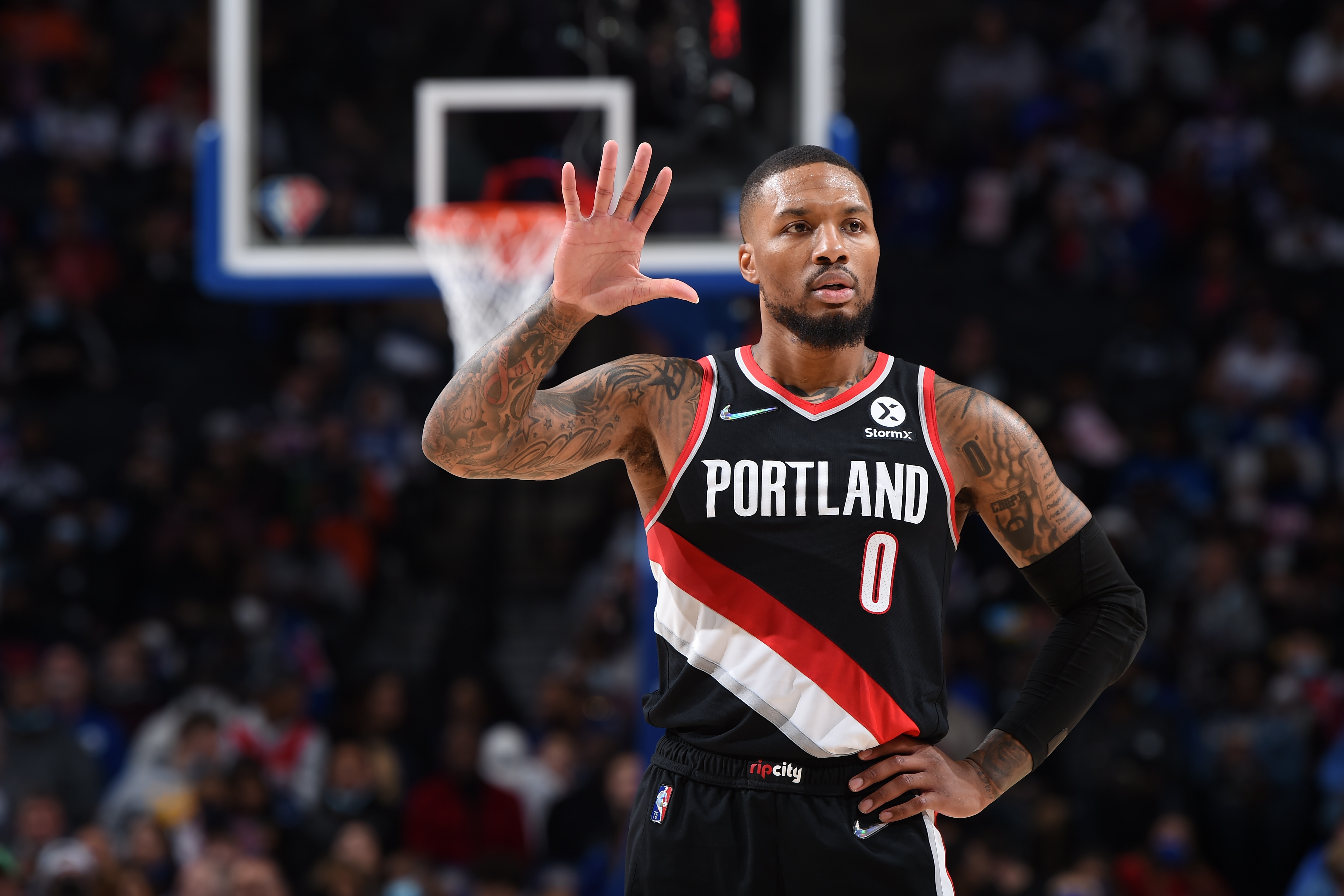 PHILADELPHIA, PA - NOVEMBER 1: Damian Lillard #0 of the Portland Trail Blazers calls out a play against the Philadelphia 76ers on November 1, 2021 at Wells Fargo Center in Philadelphia, Pennsylvania. NOTE TO USER: User expressly acknowledges and agrees that, by downloading and/or using this Photograph, user is consenting to the terms and conditions of the Getty Images License Agreement. Mandatory Copyright Notice: Copyright 2021 NBAE (Photo by David Dow/NBAE via Getty Images)
