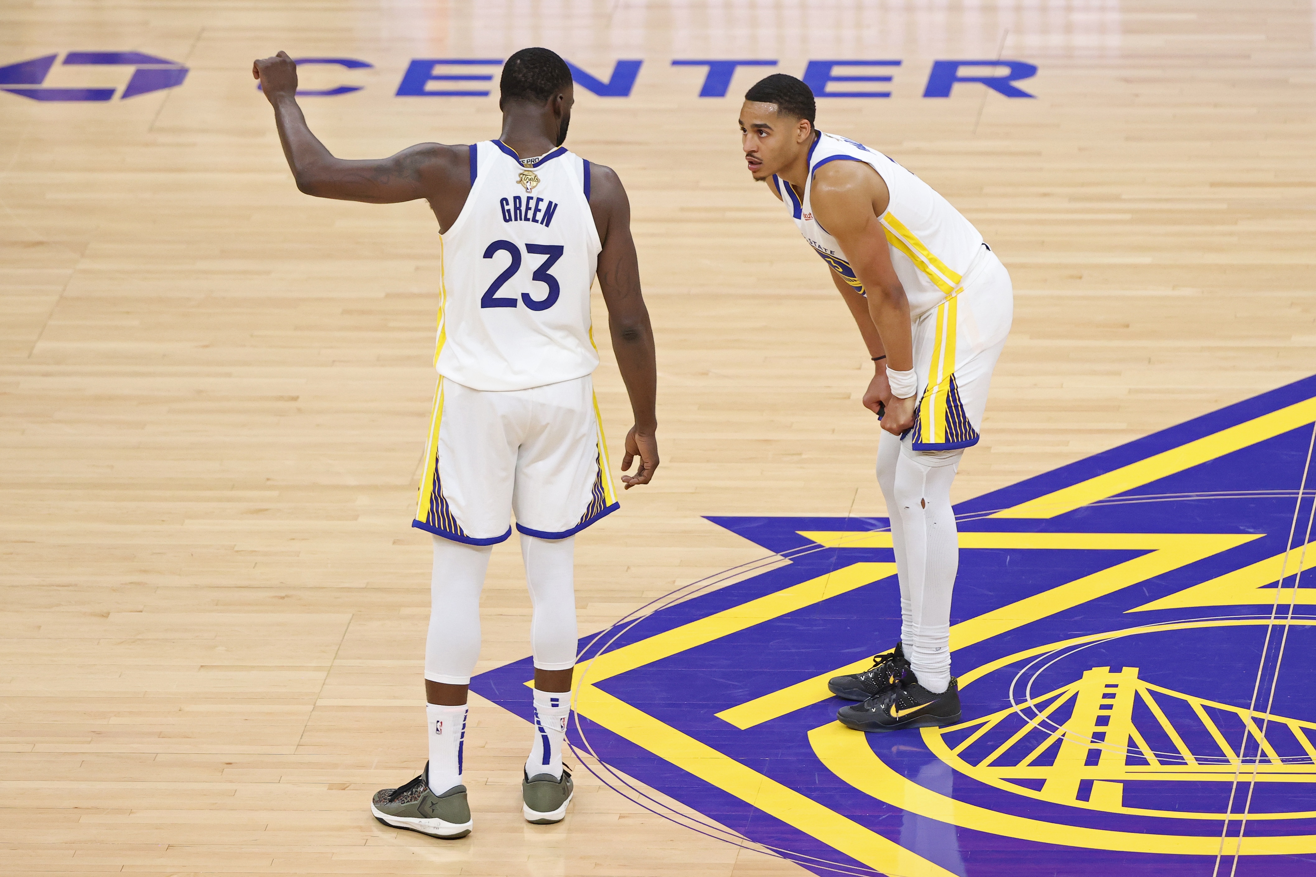 SAN FRANCISCO, CA - JUNE 2: Draymond Green #23 talks to Jordan Poole #3 of the Golden State Warriors during Game One of the 2022 NBA Finals on June 2, 2022 at Chase Center in San Francisco, California. NOTE TO USER: User expressly acknowledges and agrees that, by downloading and or using this photograph, user is consenting to the terms and conditions of Getty Images License Agreement. Mandatory Copyright Notice: Copyright 2022 NBAE (Photo by Joe Murphy/NBAE via Getty Images)