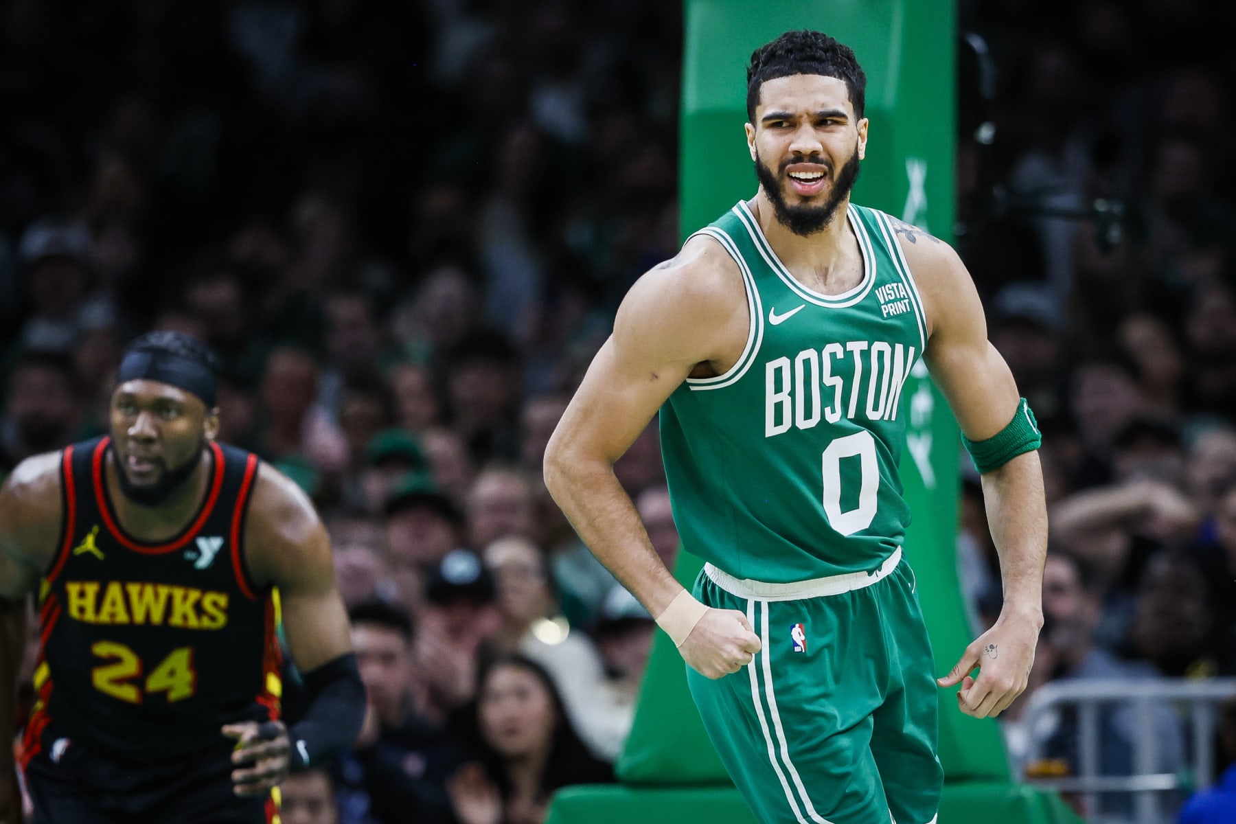 Boston, MA - February 7: Boston Celtics SF Jayson Tatum reacts after hitting a shot in the second half. The Celtics beat the Atlanta Hawks, 125-117. (Photo by Erin Clark/The Boston Globe via Getty Images)