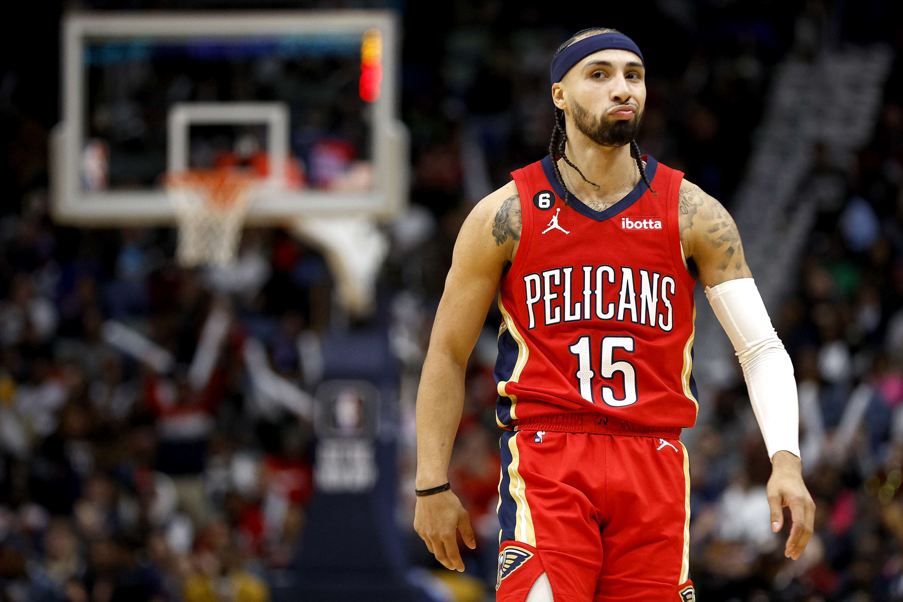 NEW ORLEANS, LOUISIANA - NOVEMBER 15: Jose Alvarado #15 of the New Orleans Pelicans reacts after socinrg during the fourth quarter of an NBA game against the Memphis Grizzlies at Smoothie King Center on November 15, 2022 in New Orleans, Louisiana.  New Orleans Pelicans won the game 113 - 102. NOTE TO USER: User expressly acknowledges and agrees that, by downloading and or using this photograph, User is consenting to the terms and conditions of the Getty Images License Agreement. (Photo by Sean Gardner/Getty Images)