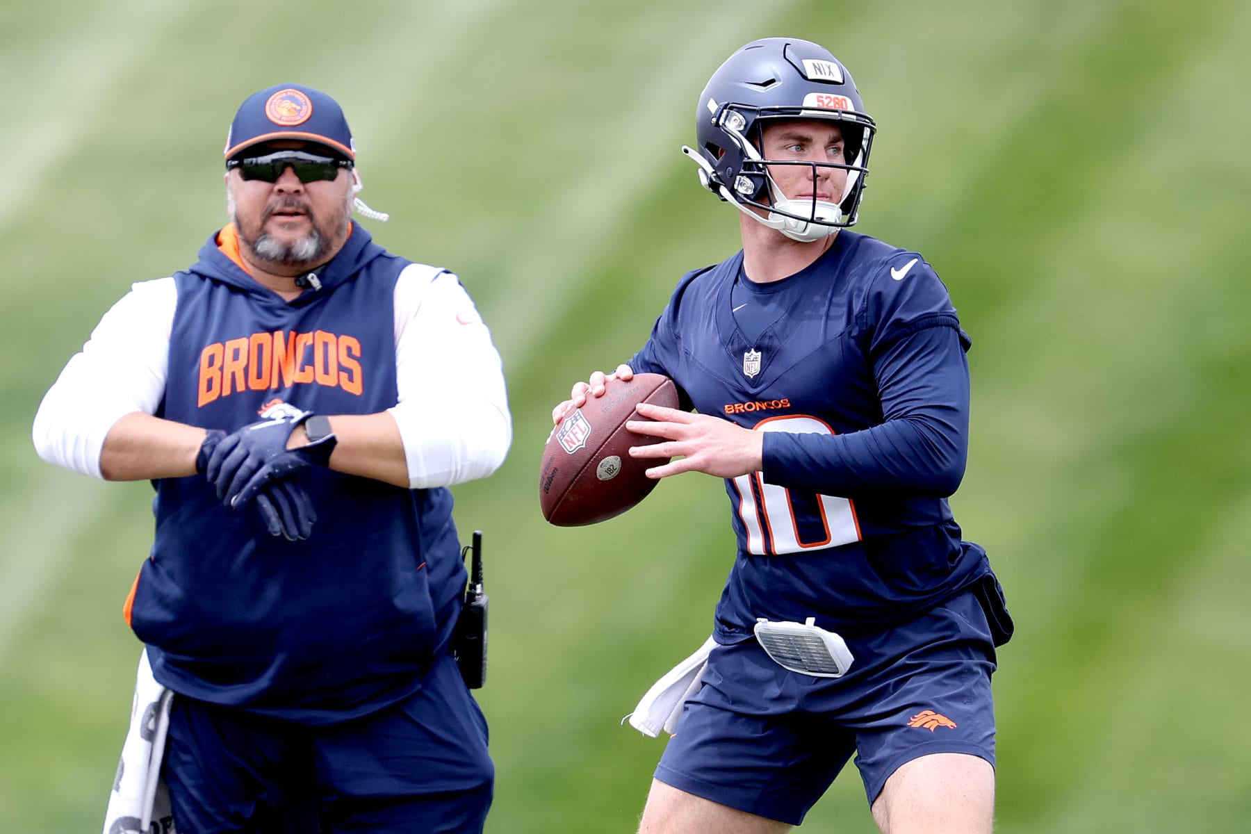 ENGLEWOOD, COLORADO - MAY 11: Quarterback Bo Nix #10 of the Denver Broncos throws during Denver Broncos Rookie Minicamp at Centura Health Training Center on May 11, 2024 in Englewood, Colorado. (Photo by Matthew Stockman/Getty Images)