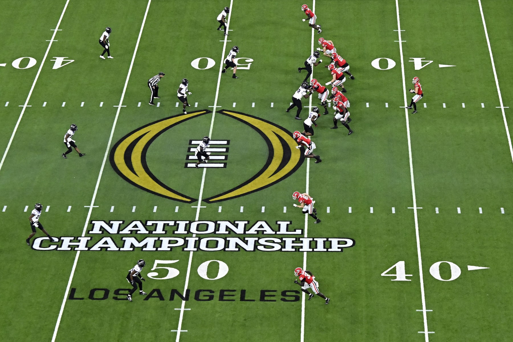 INGLEWOOD, CALIFORNIA - JANUARY 09: A view of the National Championship logo on the field as the Georgia Bulldogs run a play against the TCU Horned Frogs in the College Football Playoff National Championship game at SoFi Stadium on January 09, 2023 in Inglewood, California. (Photo by Kevork Djansezian/Getty Images)