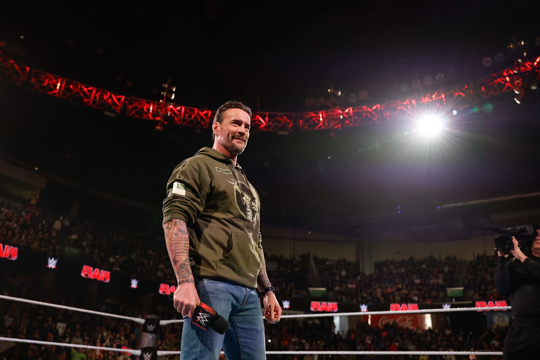EVERETT, WASHINGTON - DECEMBER 2: CM Punk enters the ring during Monday Night RAW at Angel of the Winds Arena on December 2, 2024 in Everett, Washington.  (Photo by WWE/Getty Images)