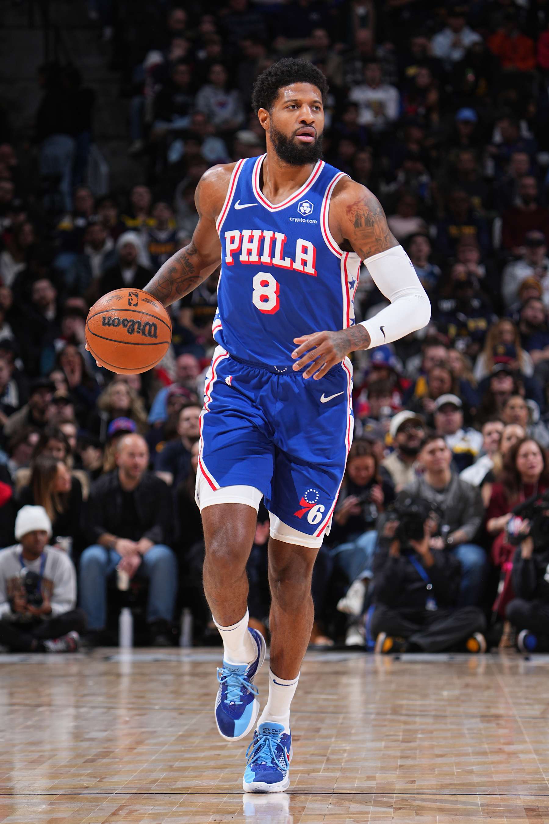 DENVER, CO - JANUARY 21: Paul George #8 of the Philadelphia 76ers dribbles the ball during the game against the Denver Nuggets on January 21, 2025 at Ball Arena in Denver, Colorado. NOTE TO USER: User expressly acknowledges and agrees that, by downloading and/or using this Photograph, user is consenting to the terms and conditions of the Getty Images License Agreement. Mandatory Copyright Notice: Copyright 2025 NBAE (Photo by Bart Young/NBAE via Getty Images)