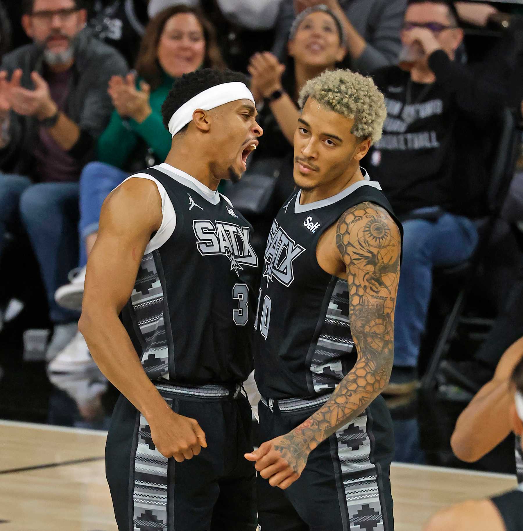 SAN ANTONIO, TX - NOVEMBER 22:  Keldon Johnson #3 of the San Antonio Spurs celebrates with Jeremy Sochan #10 in game against the Los Angeles Clippers in the second half at Frost Bank Center on November  22, 2023 in San Antonio, Texas. NOTE TO USER: User expressly acknowledges and agrees that, by downloading and or using this photograph, User is consenting to terms and conditions of the Getty Images License Agreement. (Photo by Ronald Cortes/Getty Images)