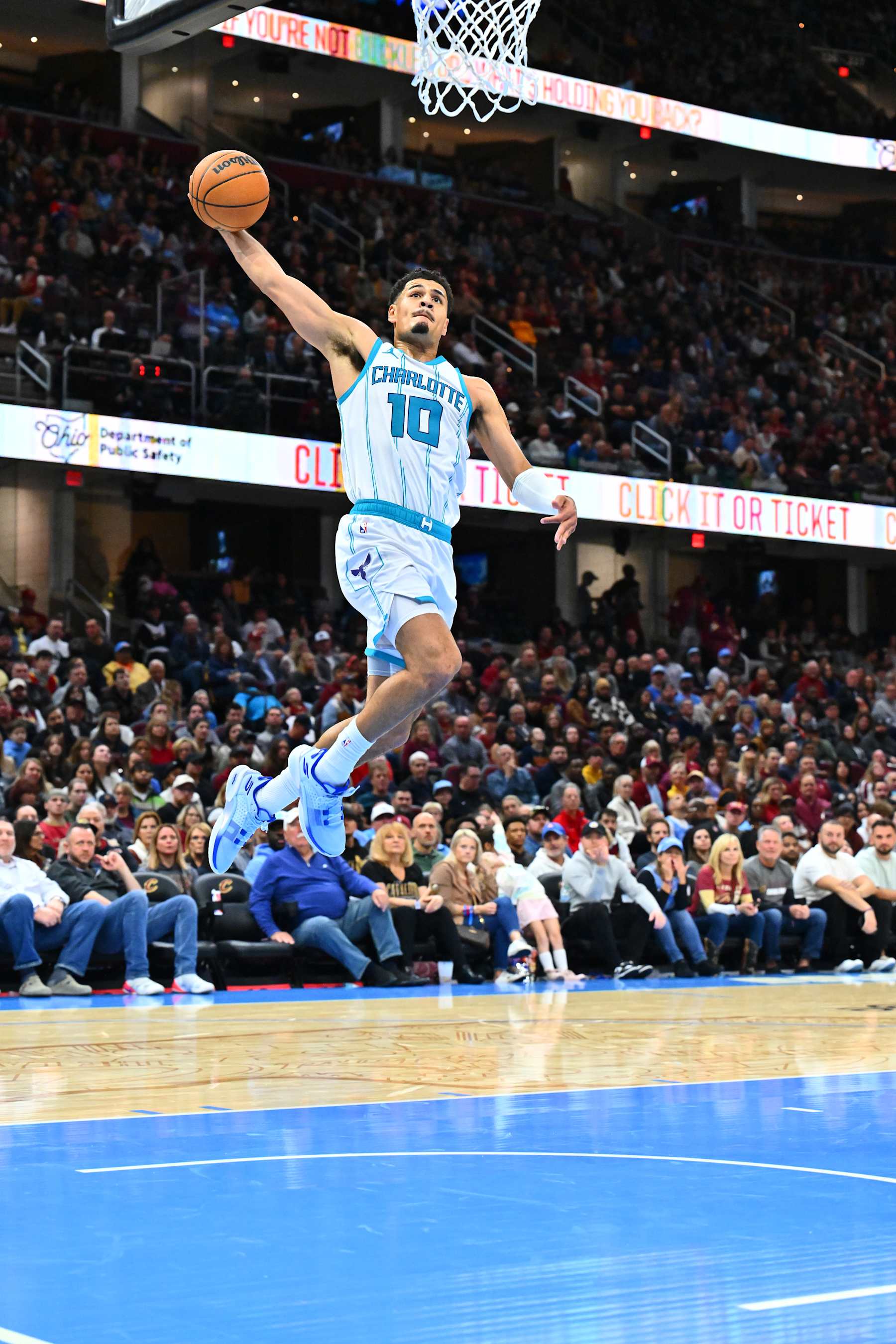 CLEVELAND, OHIO - NOVEMBER 17: Josh Green #10 of the Charlotte Hornets dunks during the second quarter against the Cleveland Cavaliers at Rocket Mortgage Fieldhouse on November 17, 2024 in Cleveland, Ohio. NOTE TO USER: User expressly acknowledges and agrees that, by downloading and or using this photograph, User is consenting to the terms and conditions of the Getty Images License Agreement. (Photo by Jason Miller/Getty Images)