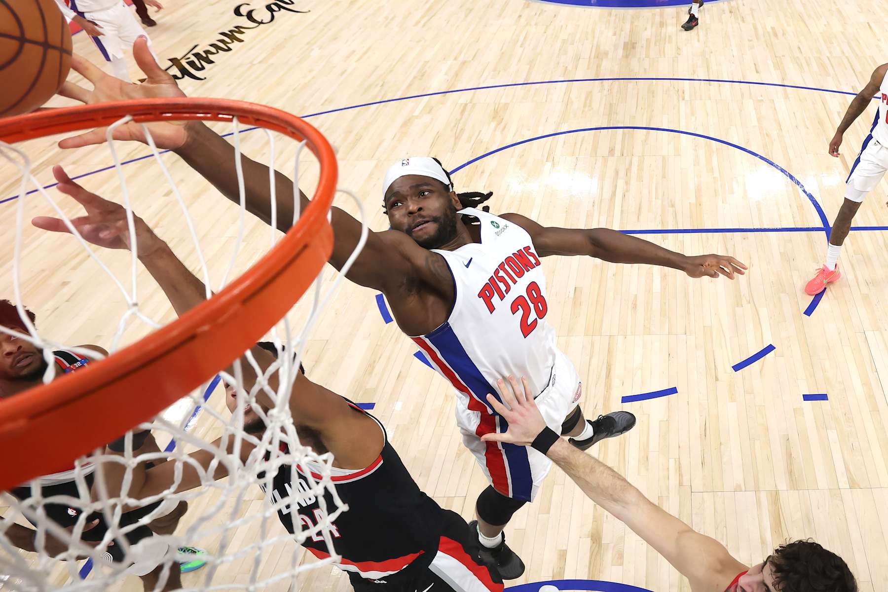 DETROIT, MICHIGAN - JANUARY 06: Isaiah Stewart #28 of the Detroit Pistons battles Kris Murray #24 of the Portland Trail Blazers for a second half rebound at Little Caesars Arena on January 06, 2025 in Detroit, Michigan. Detroit won the game 118-115. NOTE TO USER: User expressly acknowledges and agrees that, by downloading and or using this photograph, User is consenting to the terms and conditions of the Getty Images License. (Photo by Gregory Shamus/Getty Images)