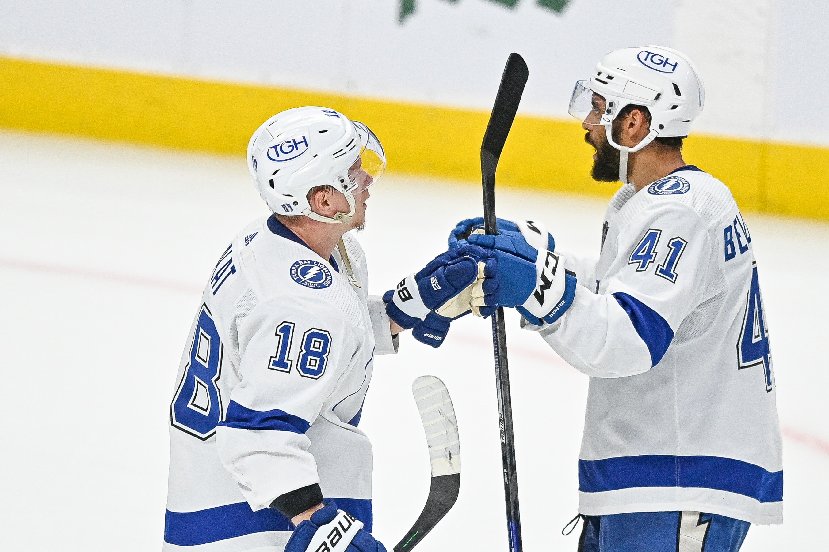 DENVER, CO - JUNE 24: Tampa Bay Lightning left wing Ondrej Palat (18) and left wing Pierre-Edouard Bellemare (41) celebrate after a win over the Colorado Avalanche during the Stanley Cup Finals game 5 between the Tampa Bay Lightning and the Colorado Avalanche at Ball Arena in Denver, Colorado on June 24, 2022. (Photo by Dustin Bradford/Icon Sportswire via Getty Images)