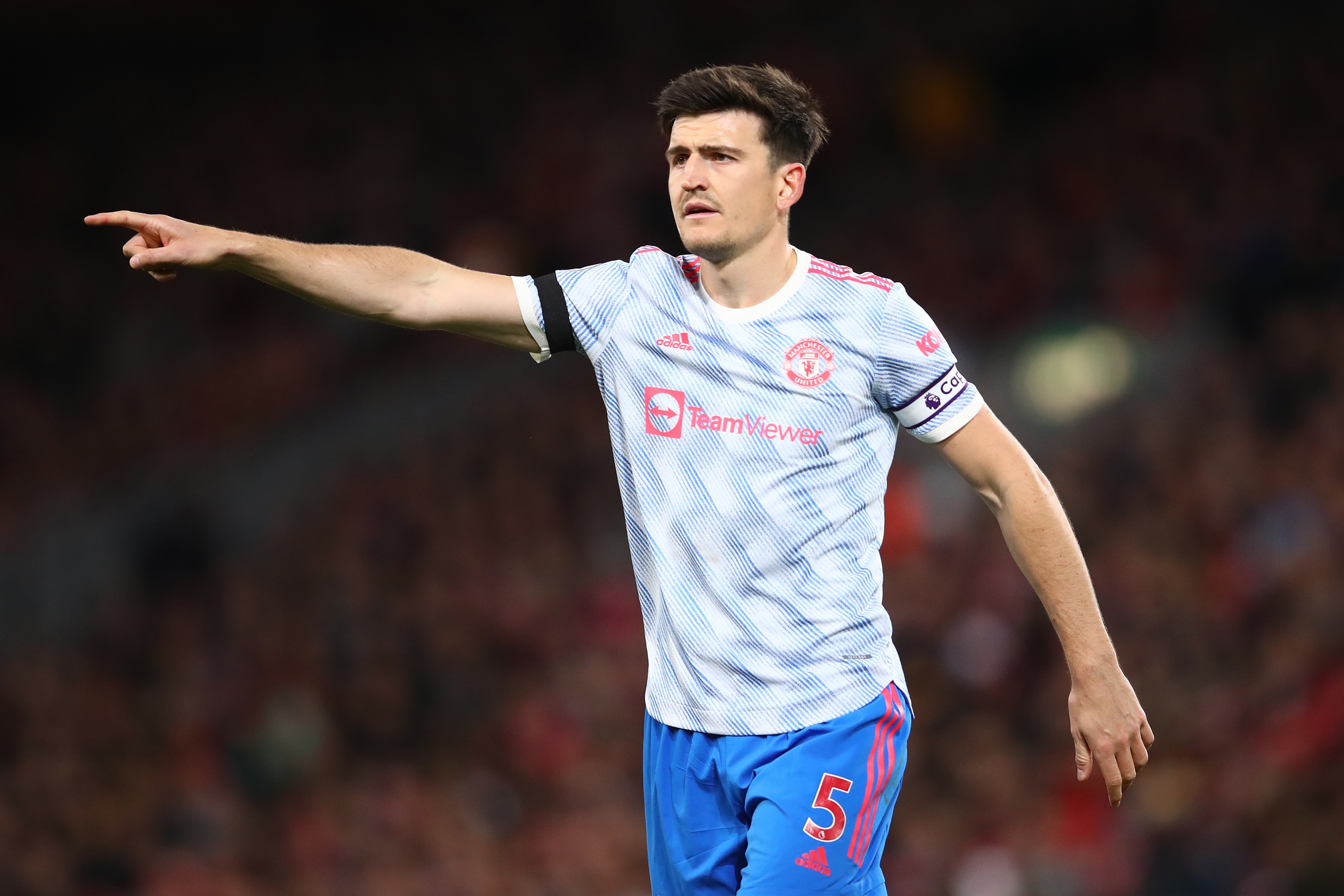 LIVERPOOL, ENGLAND - APRIL 19: Harry Maguire of Manchester United gestures during the Premier League match between Liverpool and Manchester United at Anfield on April 19, 2022 in Liverpool, England. (Photo by Chris Brunskill/Fantasista/Getty Images)