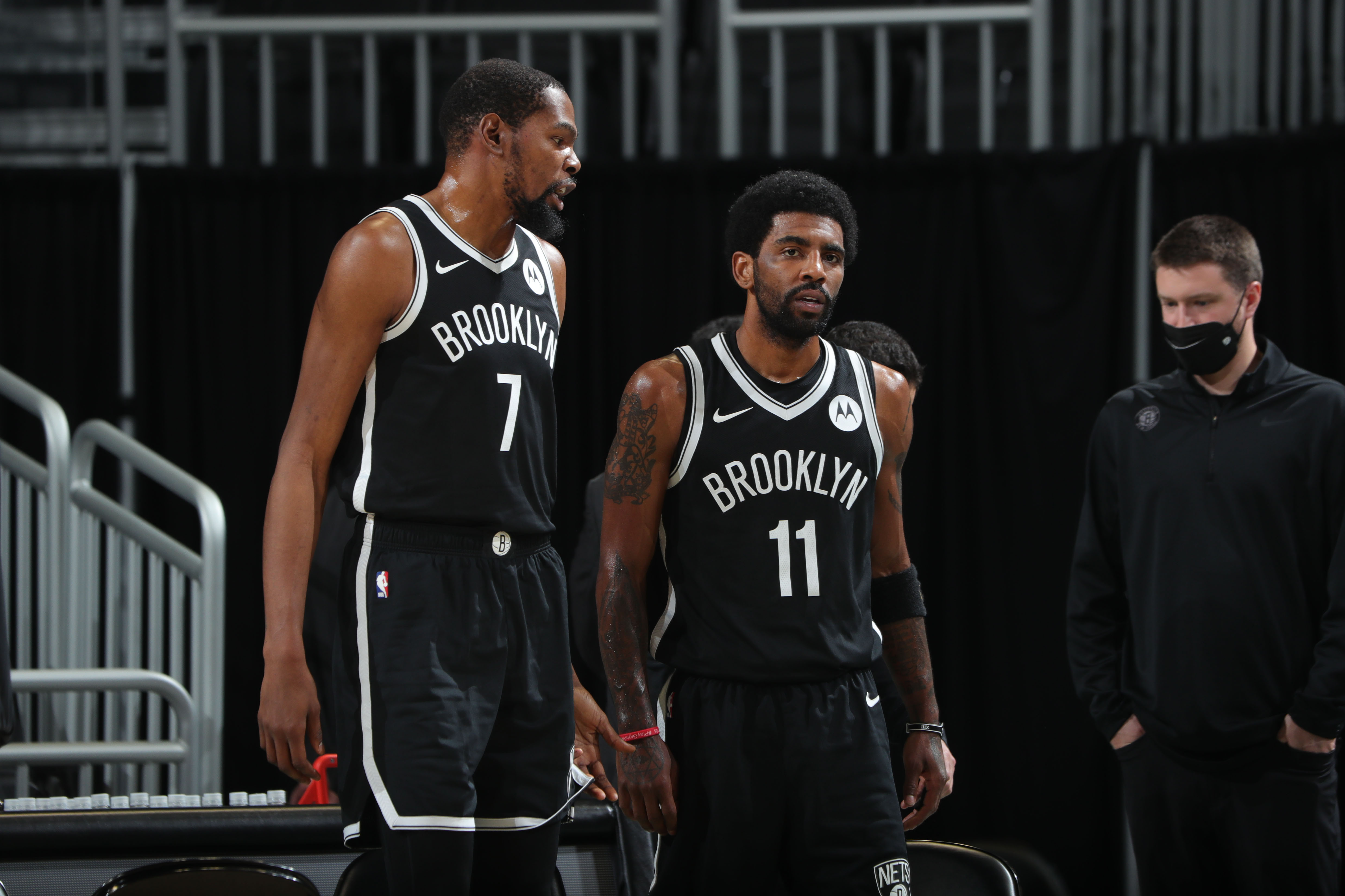 MILWAUKEE, WI - MAY 4: Kevin Durant #7 talks with Kyrie Irving #11 of the Brooklyn Nets during the game against the Milwaukee Bucks on May 4, 2021 at the Fiserv Forum Center in Milwaukee, Wisconsin. NOTE TO USER: User expressly acknowledges and agrees that, by downloading and or using this Photograph, user is consenting to the terms and conditions of the Getty Images License Agreement. Mandatory Copyright Notice: Copyright 2021 NBAE (Photo by Nathaniel S. Butler/NBAE via Getty Images).