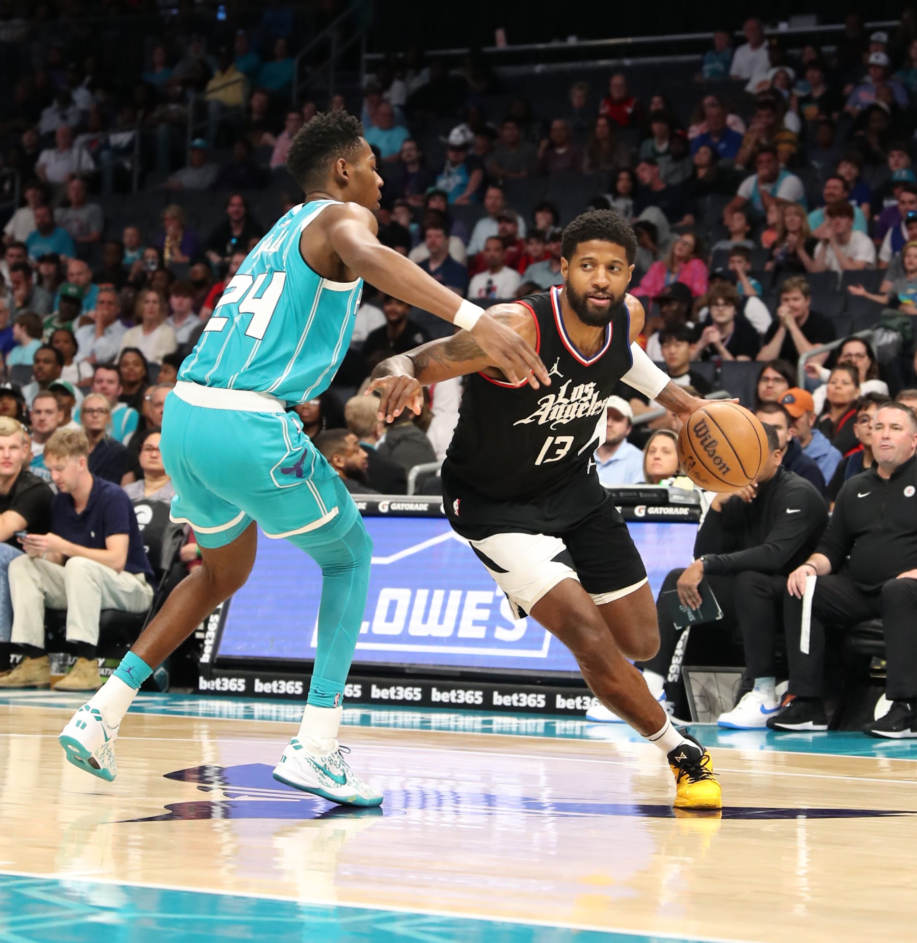CHARLOTTE, NC - MARCH 31: Paul George #13 of the LA Clippers dribbles the ball during the game against the Charlotte Hornets on March 31, 2024 at Spectrum Center in Charlotte, North Carolina. NOTE TO USER: User expressly acknowledges and agrees that, by downloading and or using this photograph, User is consenting to the terms and conditions of the Getty Images License Agreement.  Mandatory Copyright Notice:  Copyright 2024 NBAE (Photo by Brock Williams-Smith/NBAE via Getty Images)
