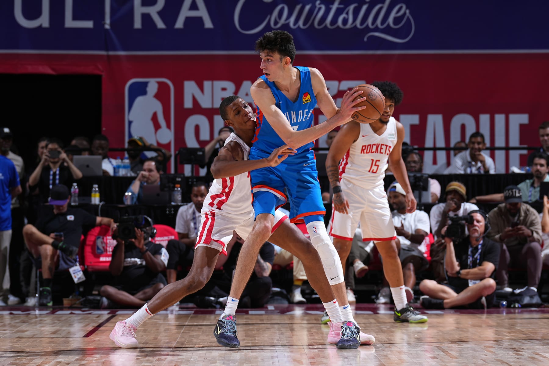 LAS VEGAS, NV - JULY 9: Chet Holmgren #7 handles the ball during the game during the game against the Houston Rockets during the 2022 Las Vegas Summer League on July 9, 2022 at the Thomas & Mack Center in Las Vegas, Nevada NOTE TO USER: User expressly acknowledges and agrees that, by downloading and/or using this Photograph, user is consenting to the terms and conditions of the Getty Images License Agreement. Mandatory Copyright Notice: Copyright 2022 NBAE (Photo by Garrett Ellwood/NBAE via Getty Images)
