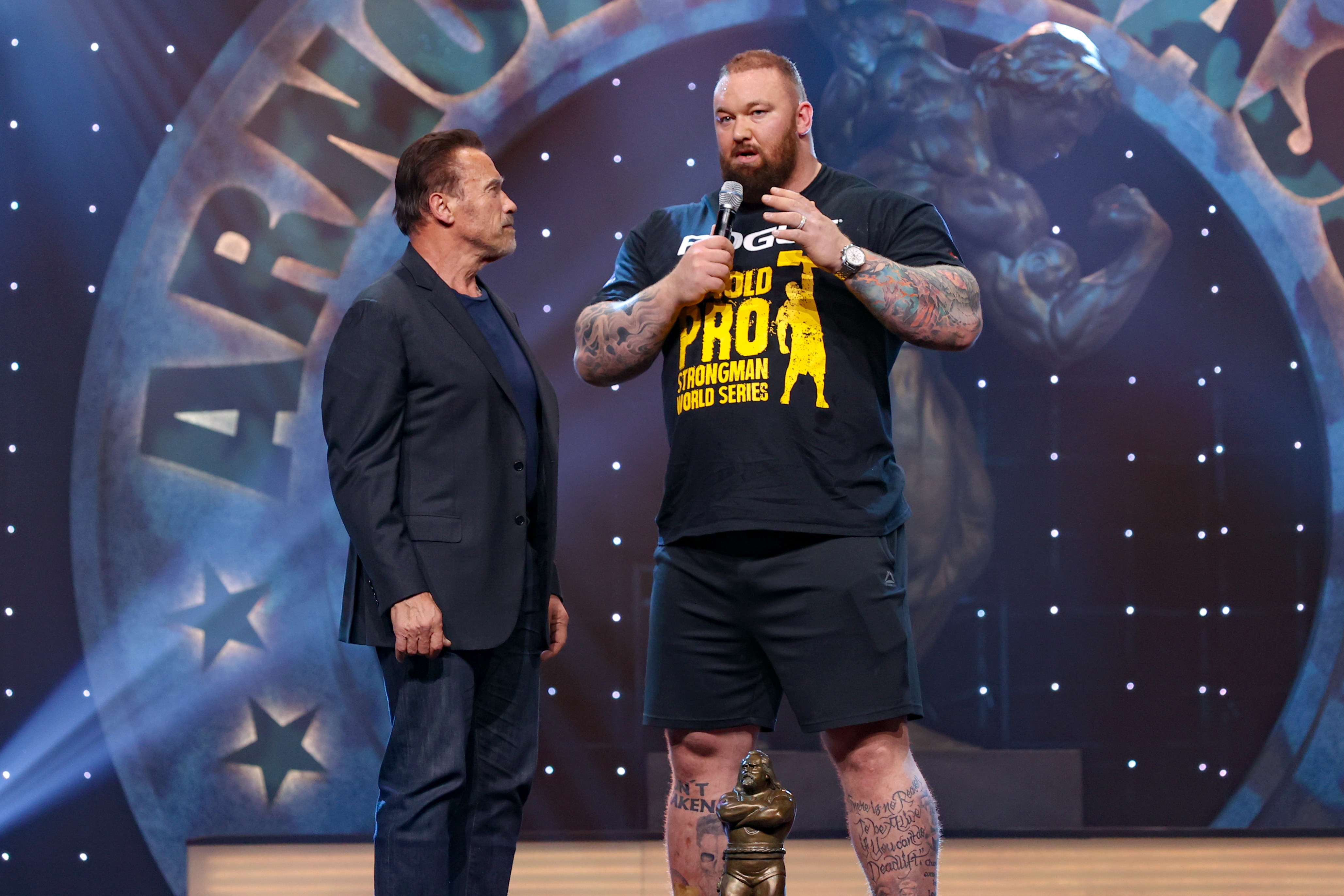 COLUMBUS, OH - MARCH 07: Arnold Schwarzenegger interviews Hafthor Bjornsson of Iceland after Bjornsson won the Arnold Strongman Classic title for the third straight year as part of the Arnold Sports Festival on March 7, 2020, at the Greater Columbus Convention Center in Columbus, OH. (Photo by Frank Jansky/Icon Sportswire via Getty Images)